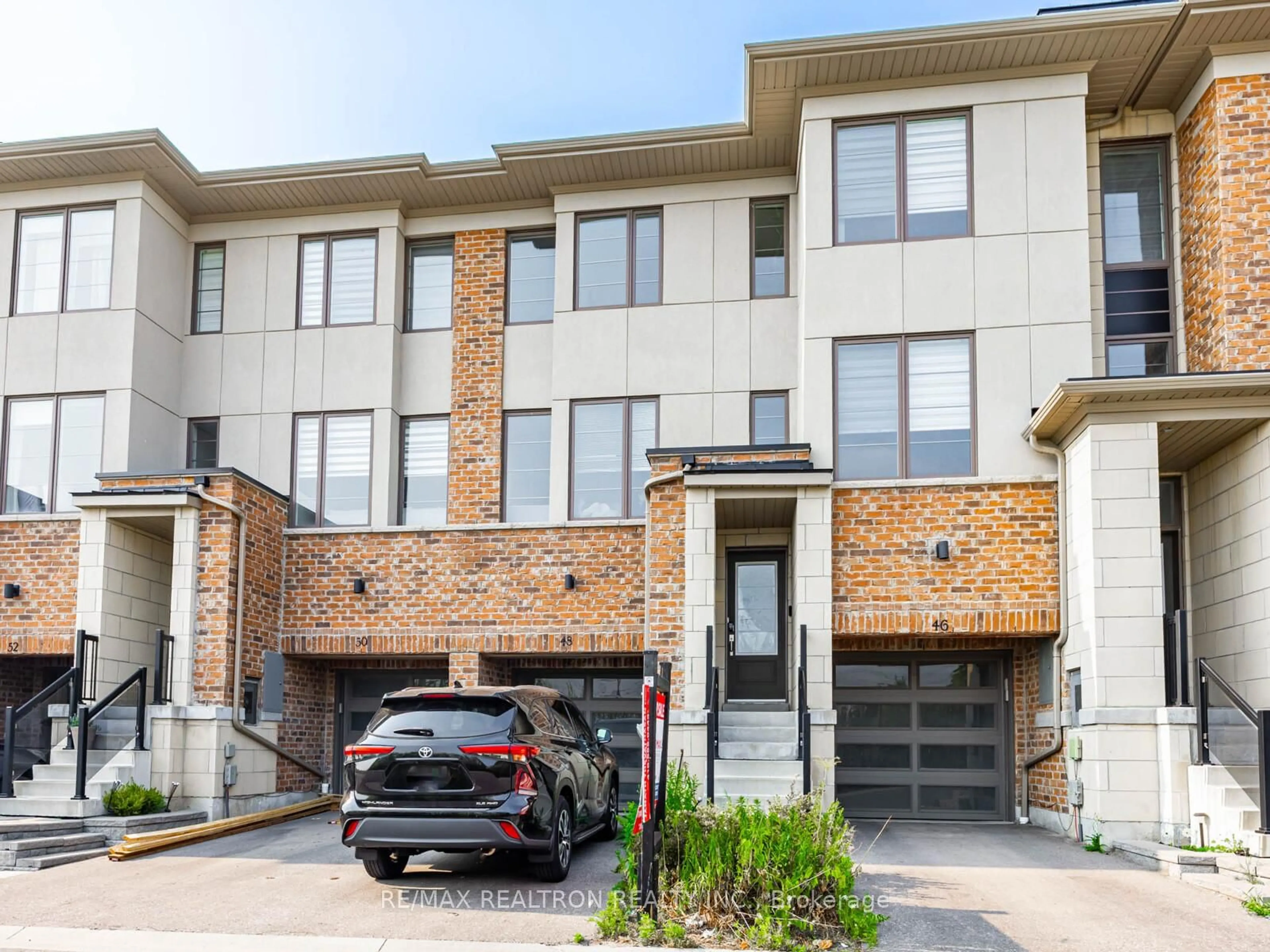 Home with brick exterior material, street for 48 Shawfield Way, Whitby Ontario L1R 0N8