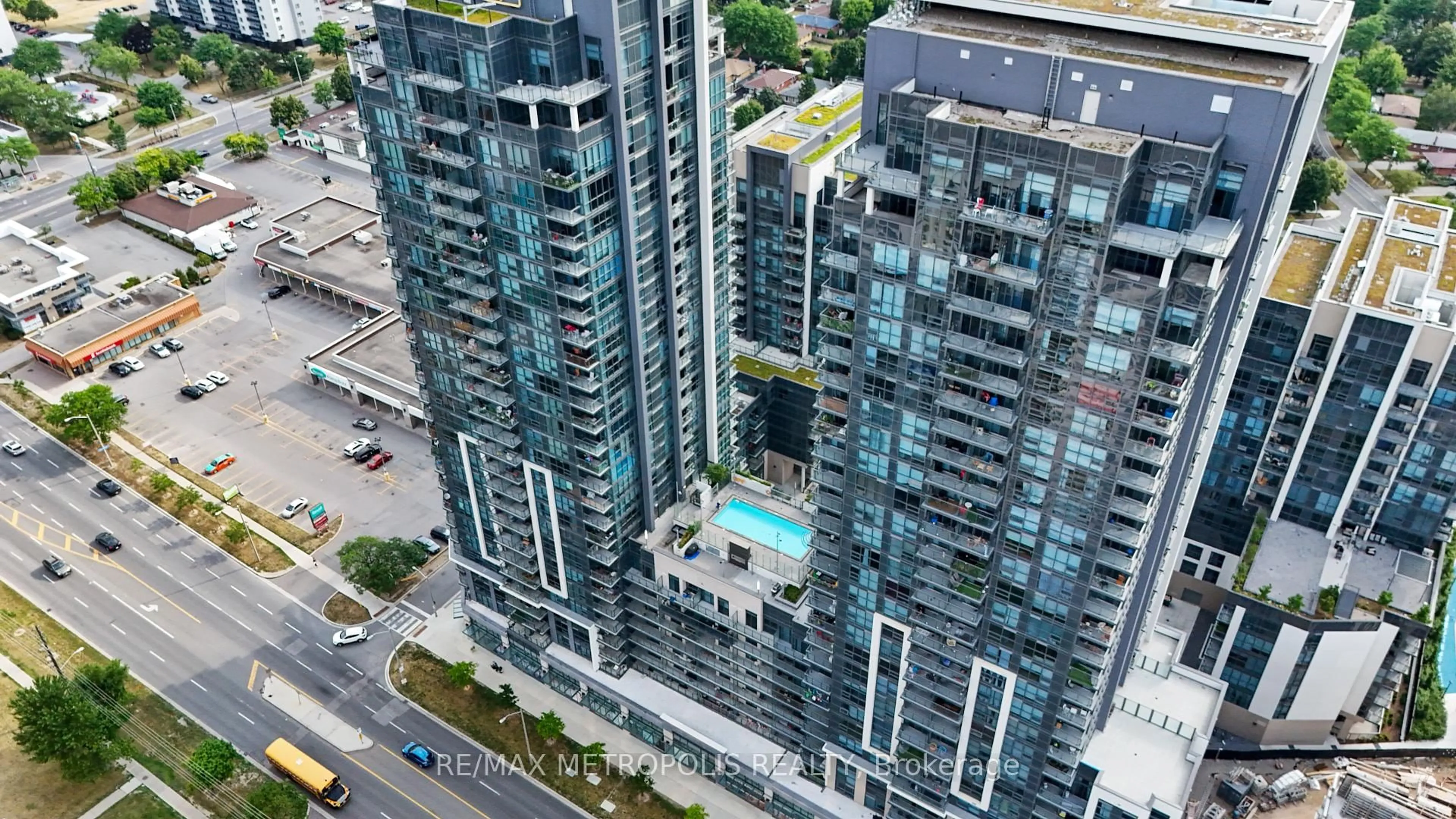 A pic from outside/outdoor area/front of a property/back of a property/a pic from drone, city buildings view from balcony for 20 Meadowglen Pl #2310, Toronto Ontario M1G 0A9