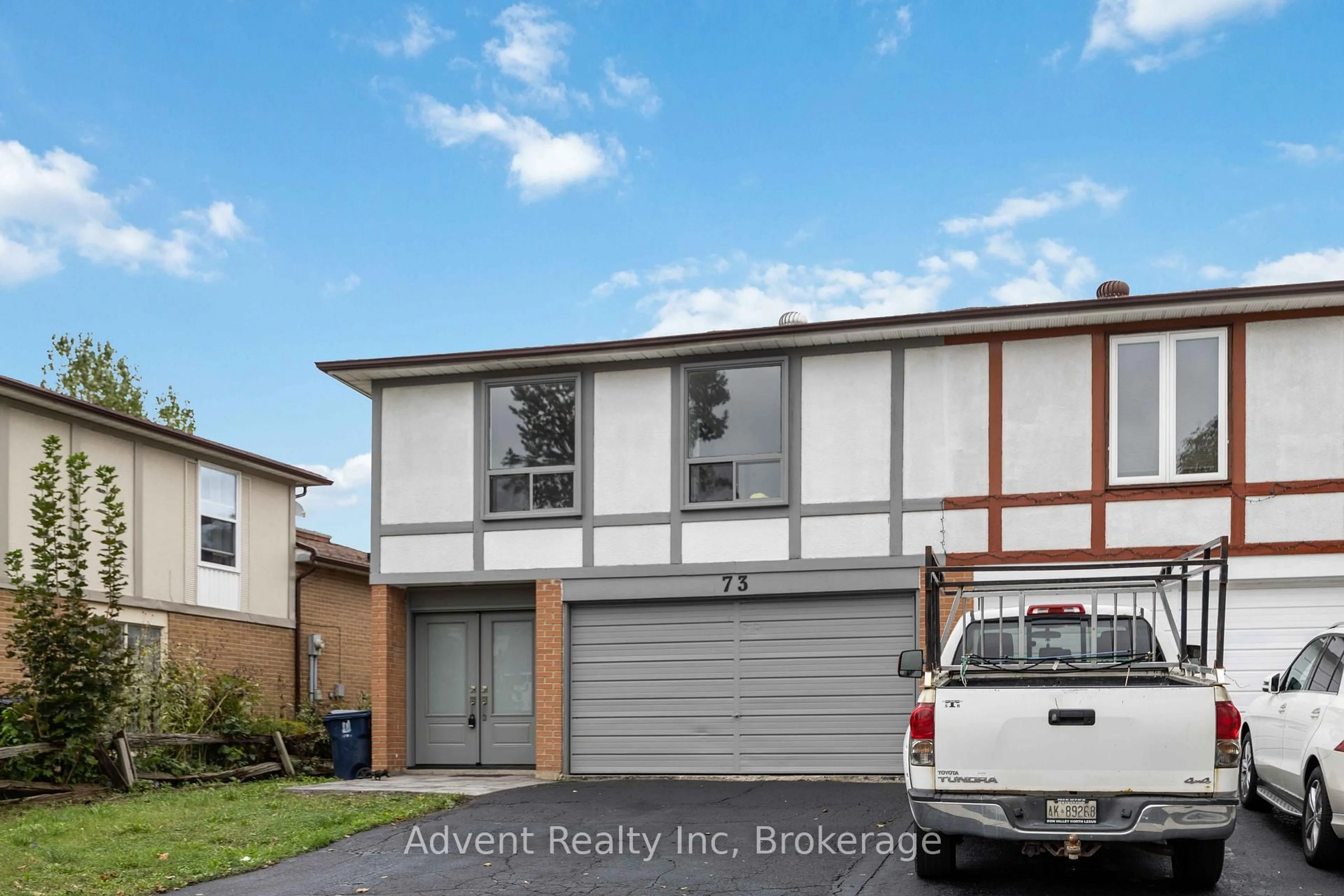 Home with vinyl exterior material, street for 73 Glen Springs Dr, Toronto Ontario M1W 1X7