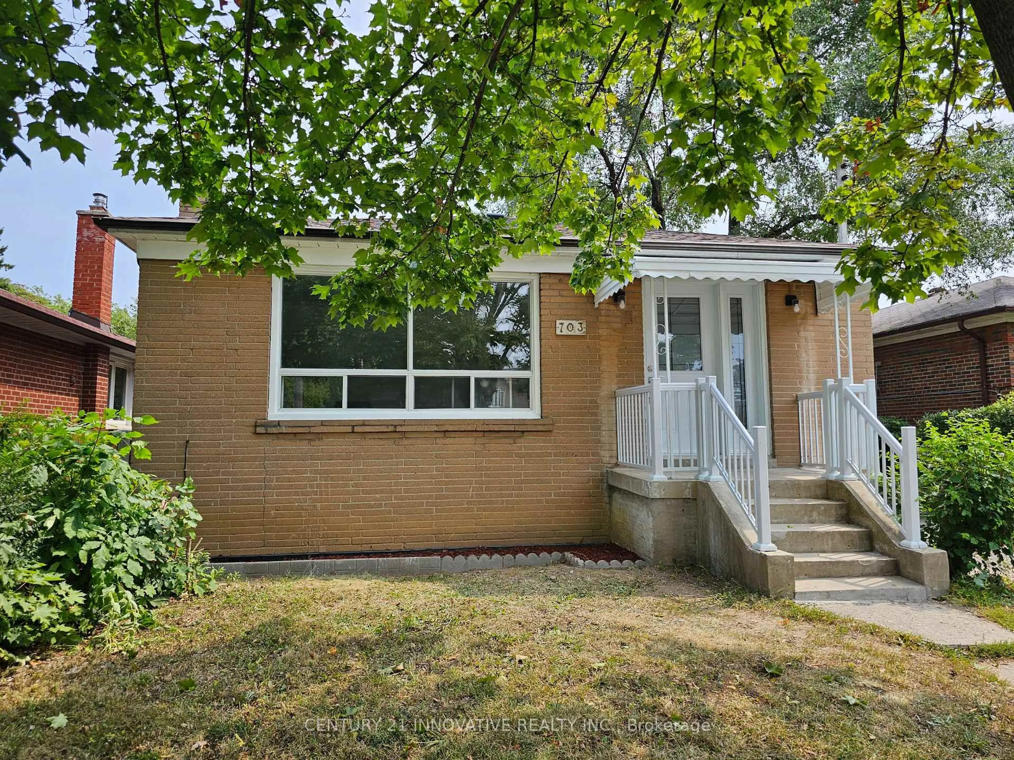 Home with brick exterior material, street for 703 Midland Ave, Toronto Ontario M1K 4E3
