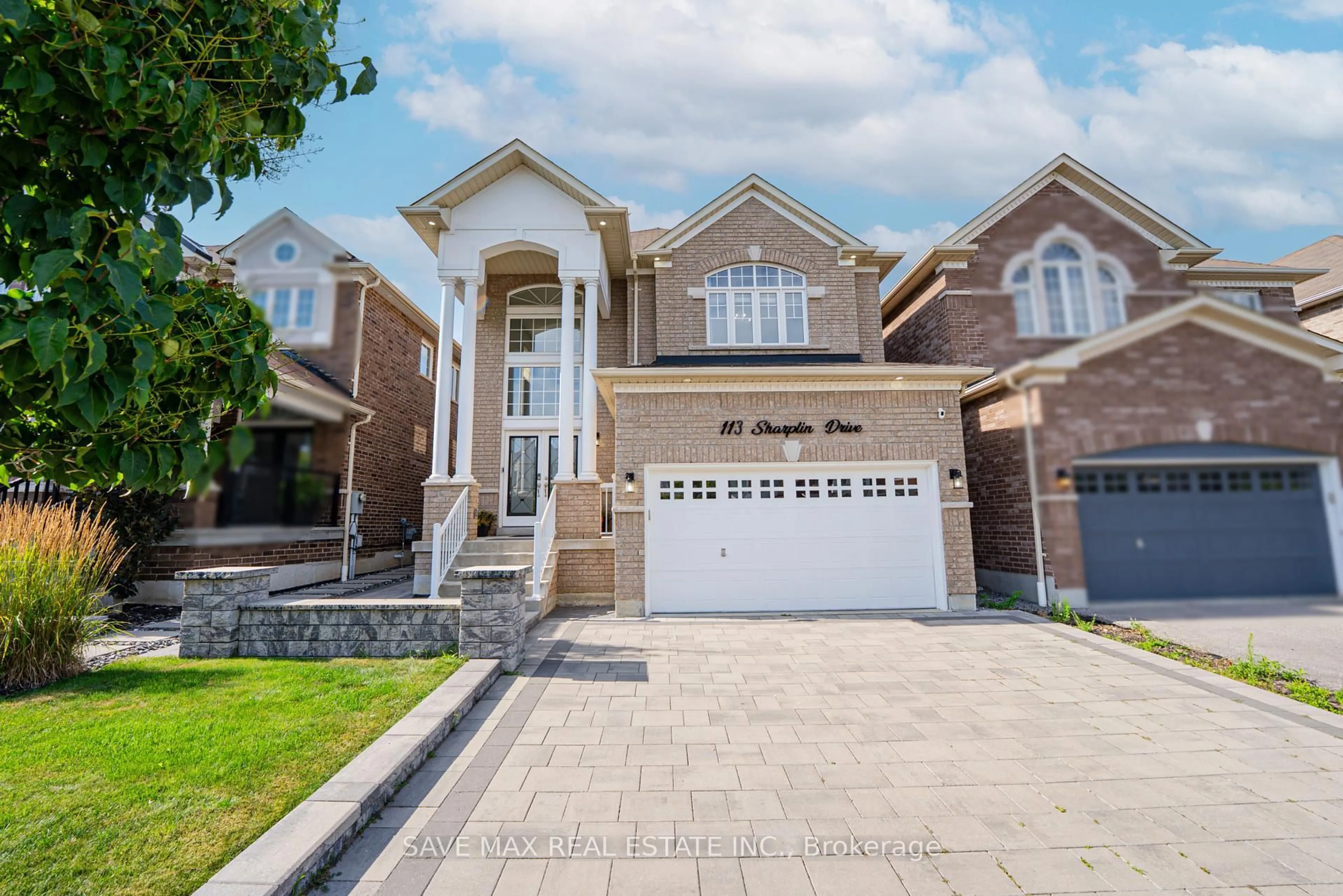 Home with brick exterior material, street for 113 Sharplin Dr, Ajax Ontario L1Z 0P3