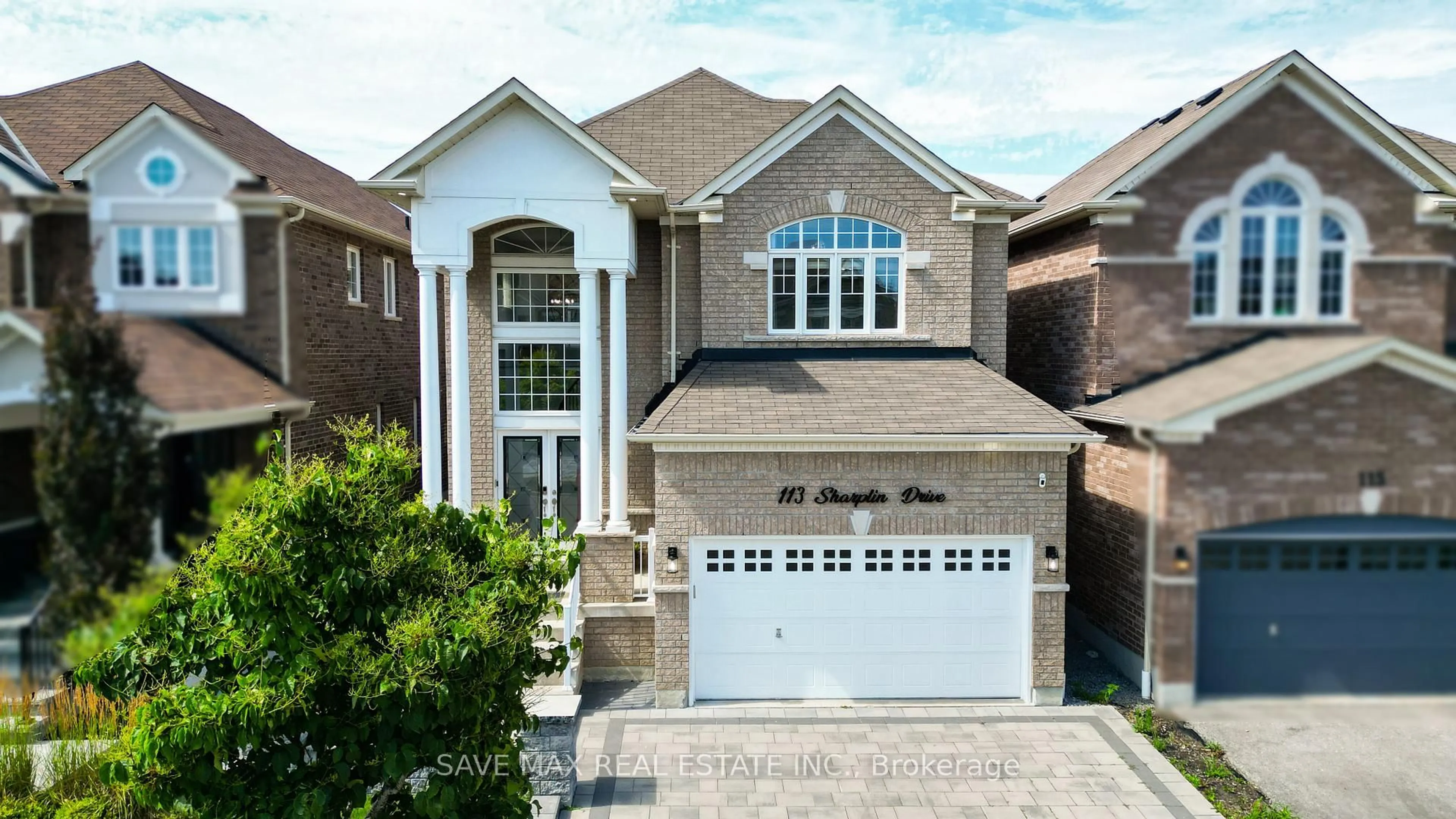 Home with brick exterior material, street for 113 Sharplin Dr, Ajax Ontario L1Z 0P3