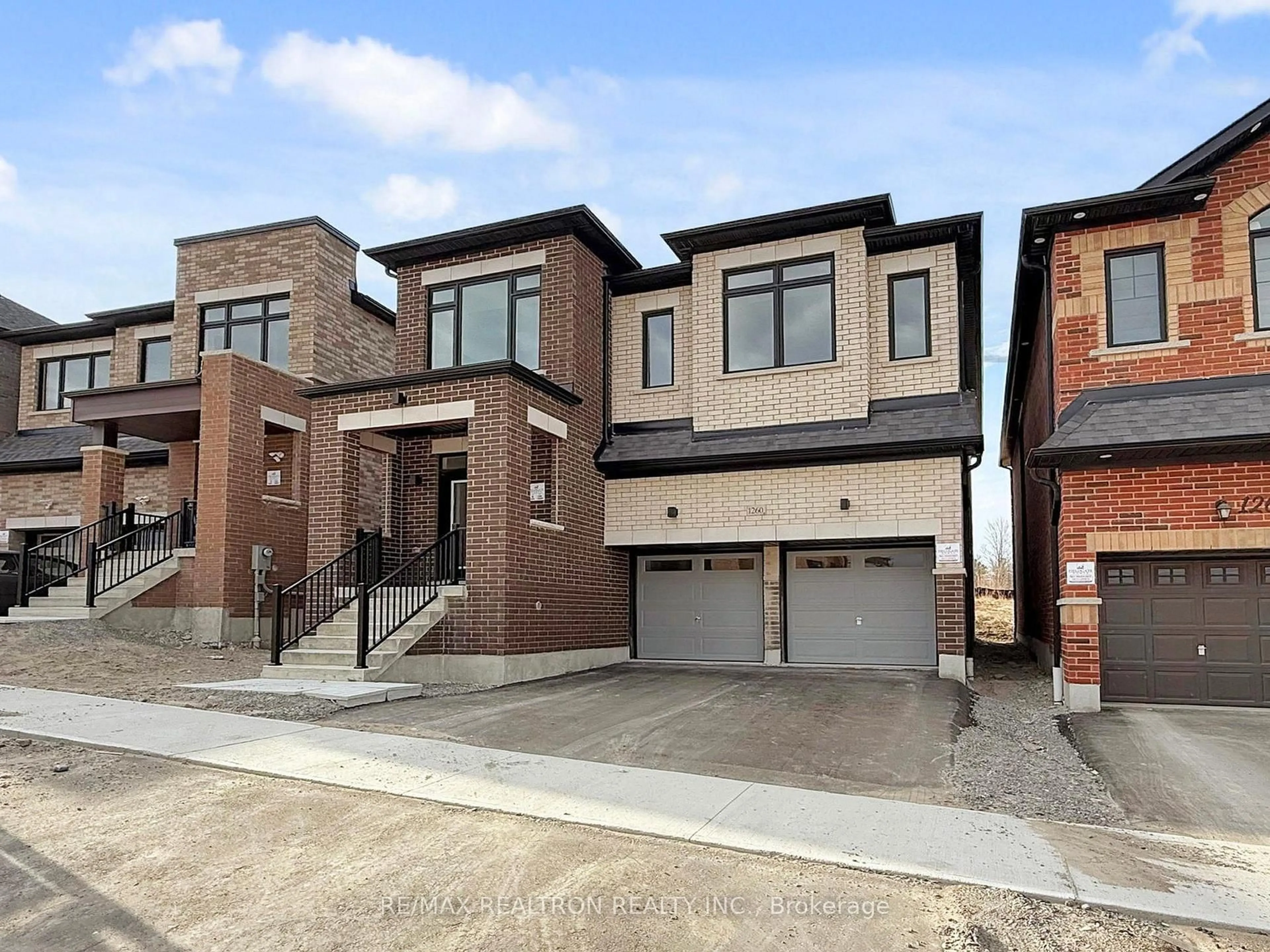 Home with brick exterior material, street for 1260 Talisman Manr, Pickering Ontario L1X 0R8