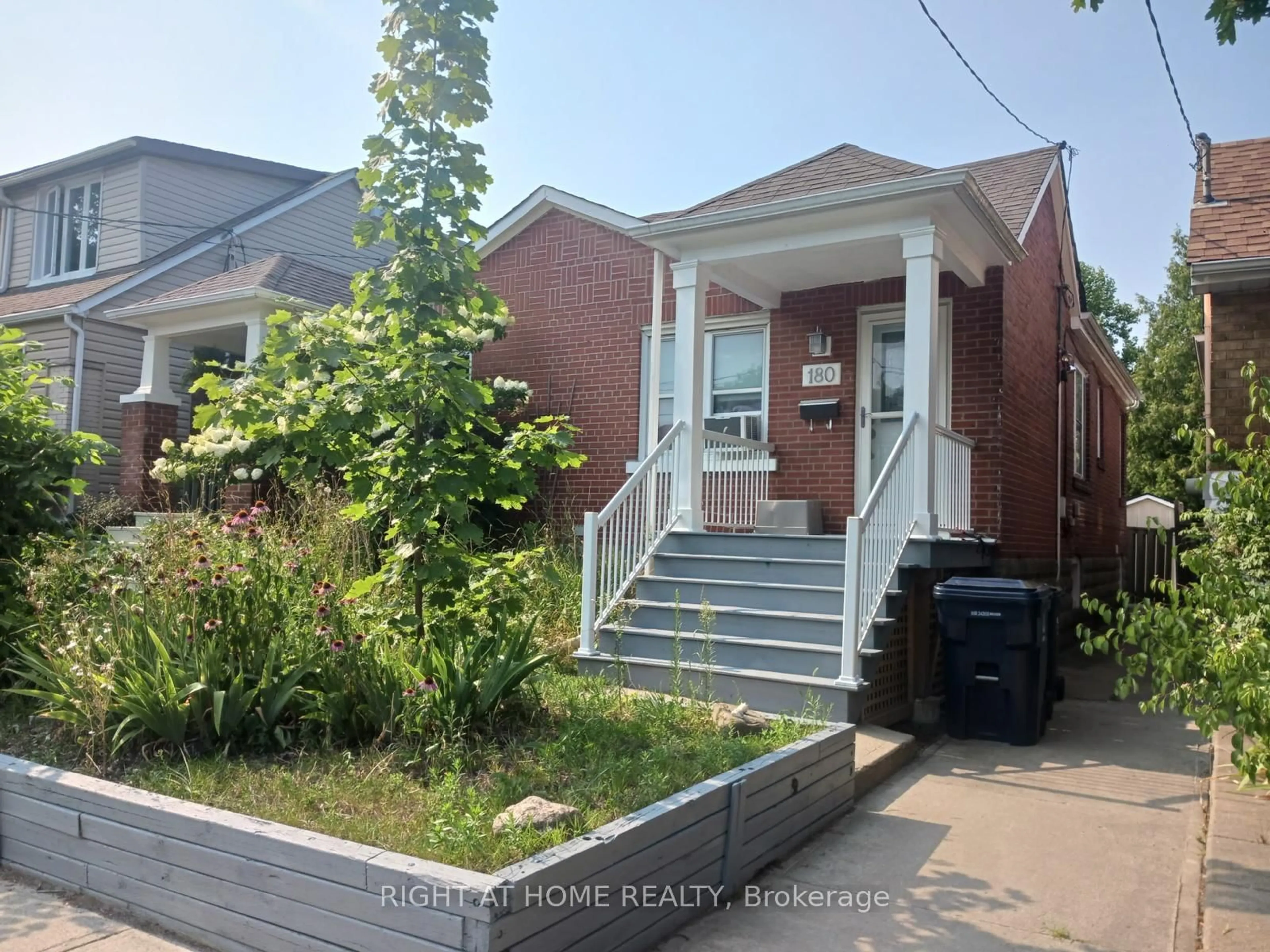 Home with brick exterior material, street for 180 Swanwick Ave, Toronto Ontario M4E 2A6