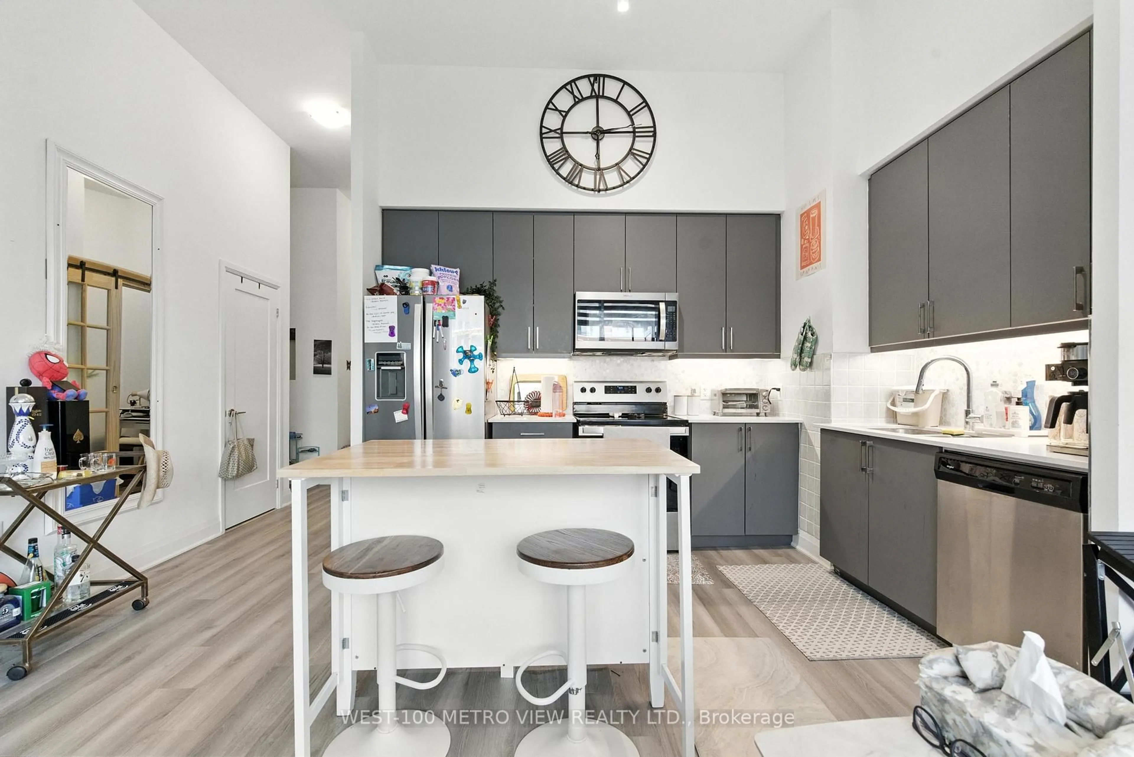 Open concept kitchen, ceramic/tile floor for 3220 Sheppard Ave #101, Toronto Ontario M1T 0B7