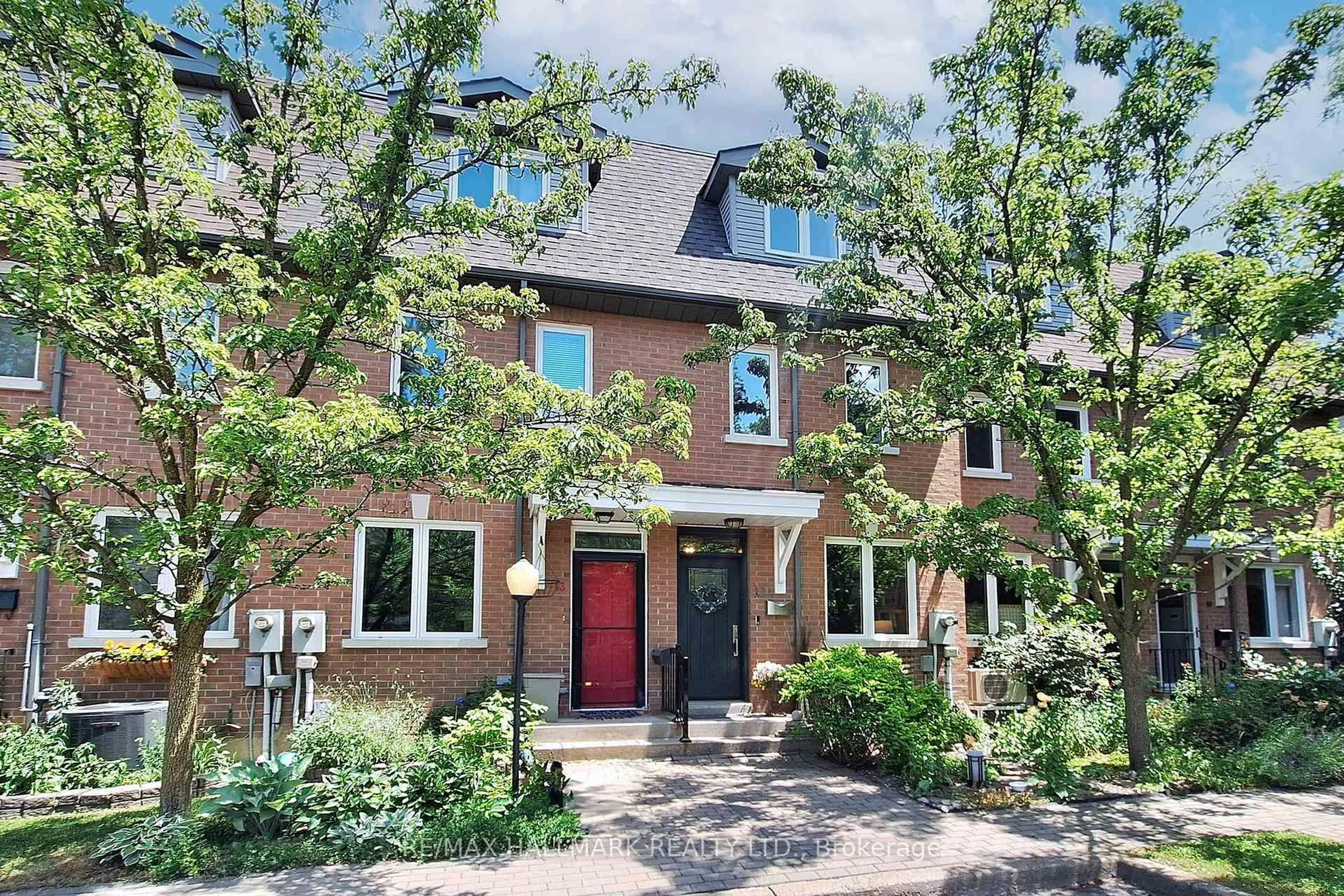 Home with brick exterior material, street for 99 Goodwood Park Crt #12, Toronto Ontario M4C 5S9