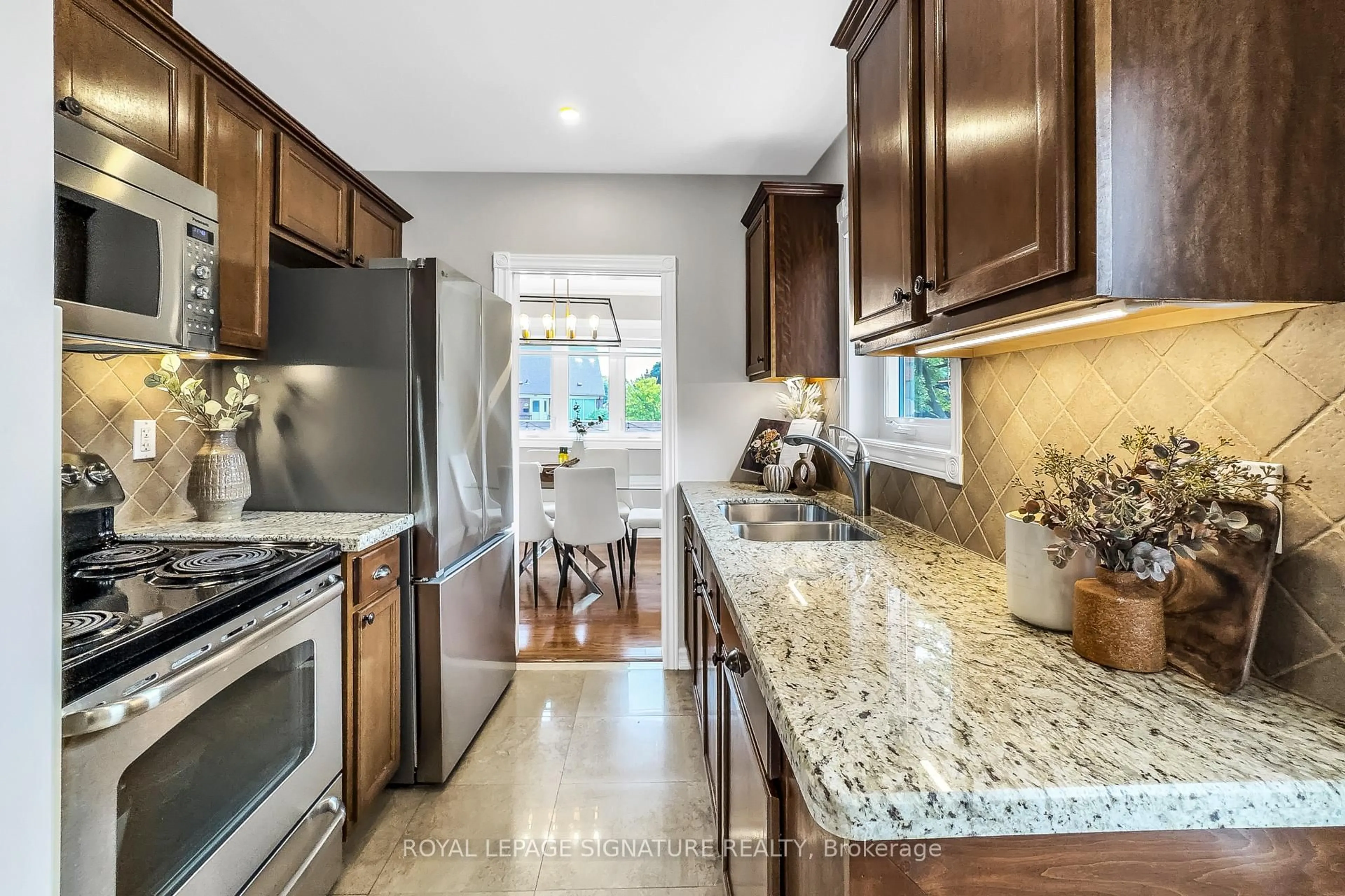 Open concept kitchen, ceramic/tile floor for 52 Ivorwood Cres, Toronto Ontario M1R 2X4