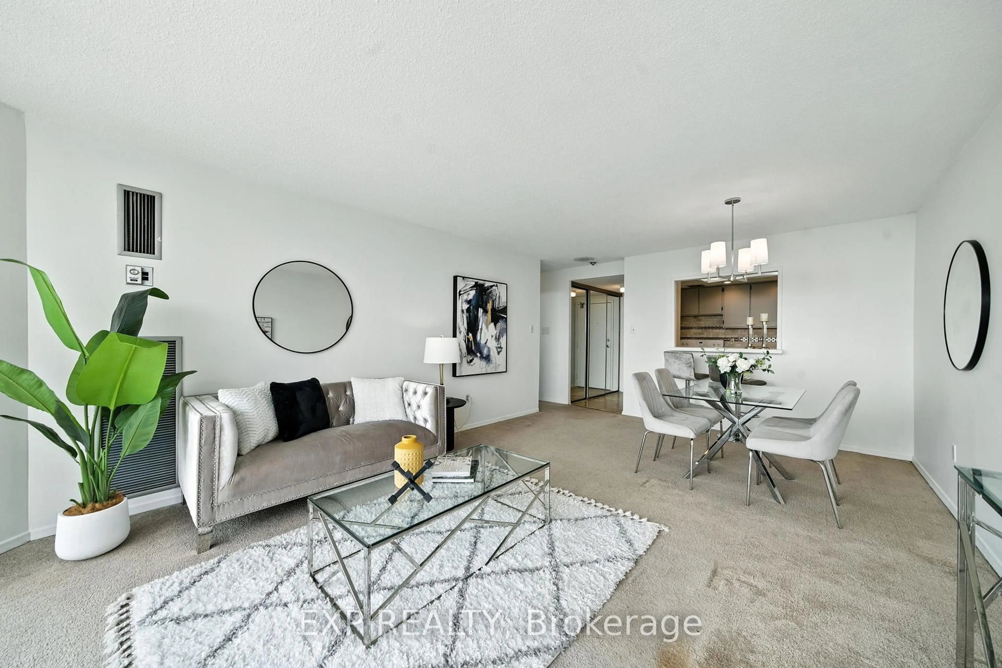 Living room with furniture, unknown for 10 Dean Park Rd #1014, Toronto Ontario M1B 3G8