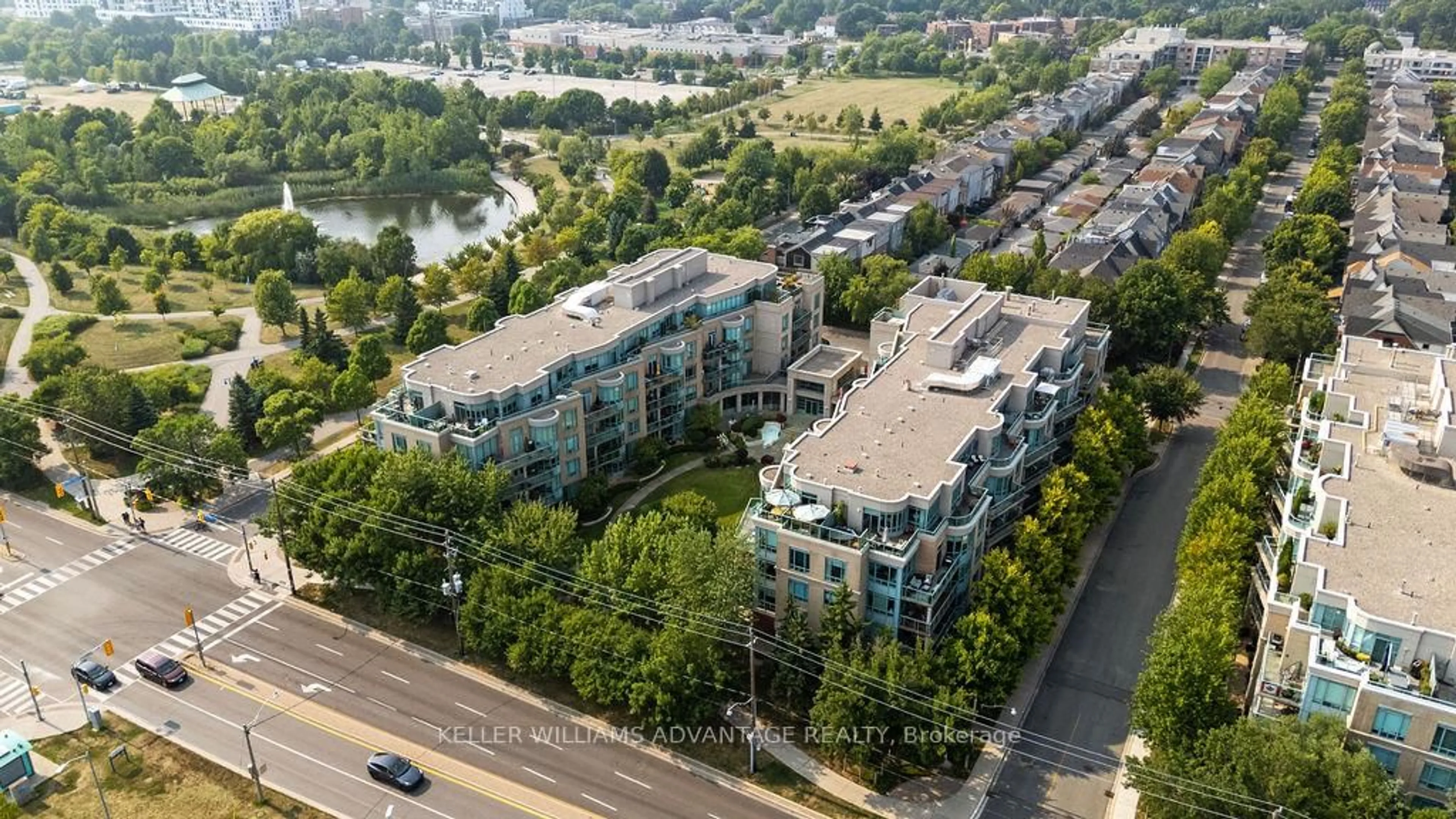 A pic from outside/outdoor area/front of a property/back of a property/a pic from drone, city buildings view from balcony for 9 Boardwalk Dr #111, Toronto Ontario M4L 6T1