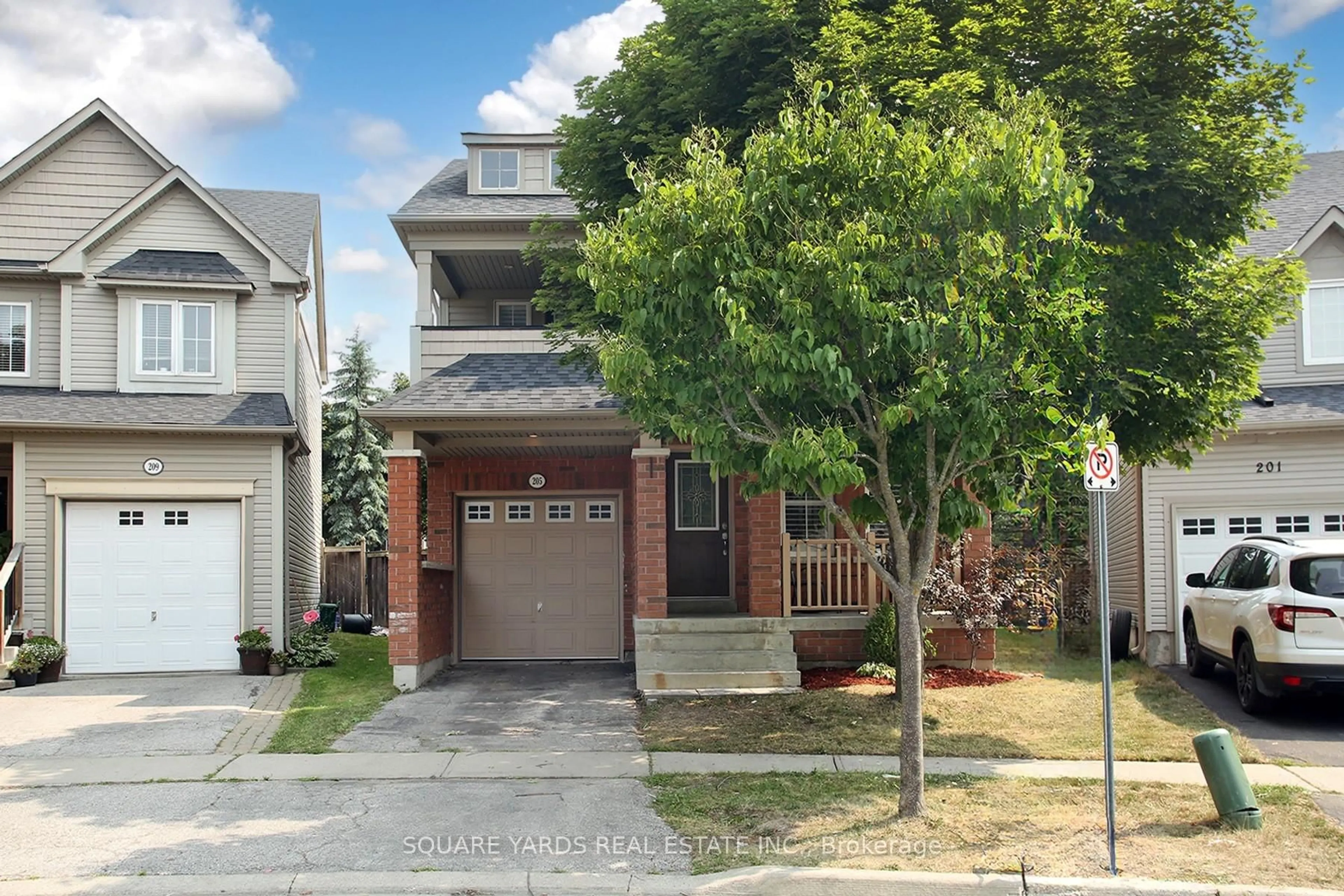 Home with brick exterior material, street for 205 Norland St, Oshawa Ontario L1L 0A6