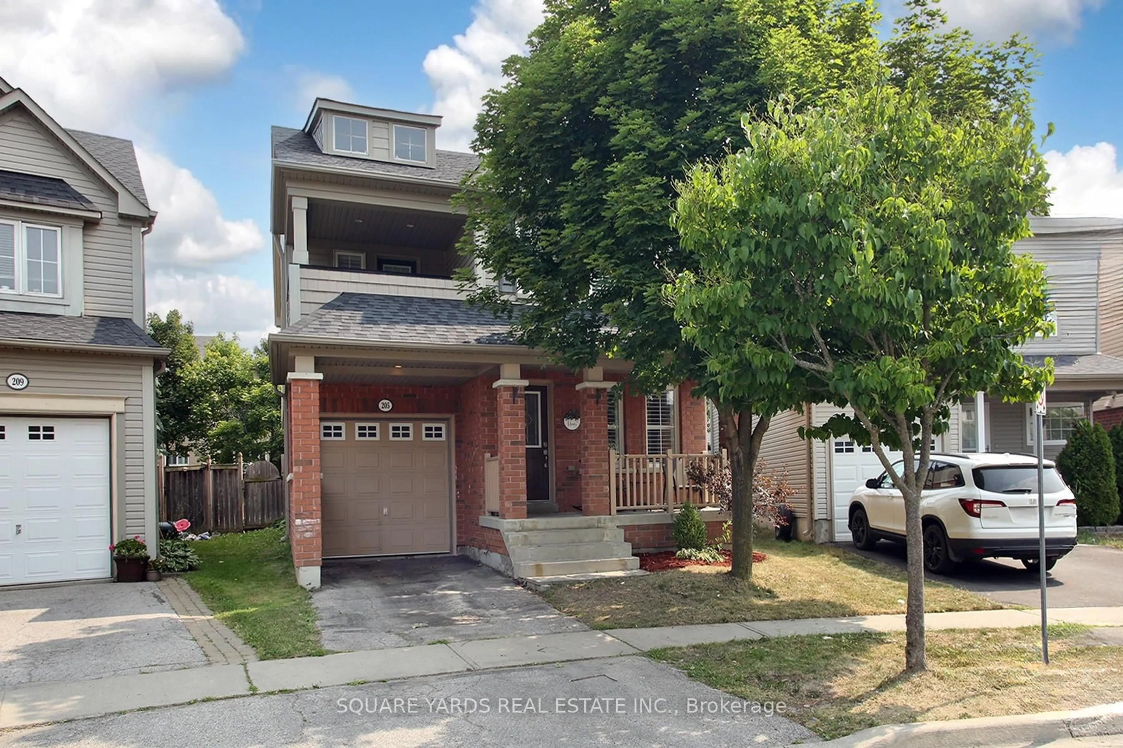 Home with brick exterior material, street for 205 Norland St, Oshawa Ontario L1L 0A6