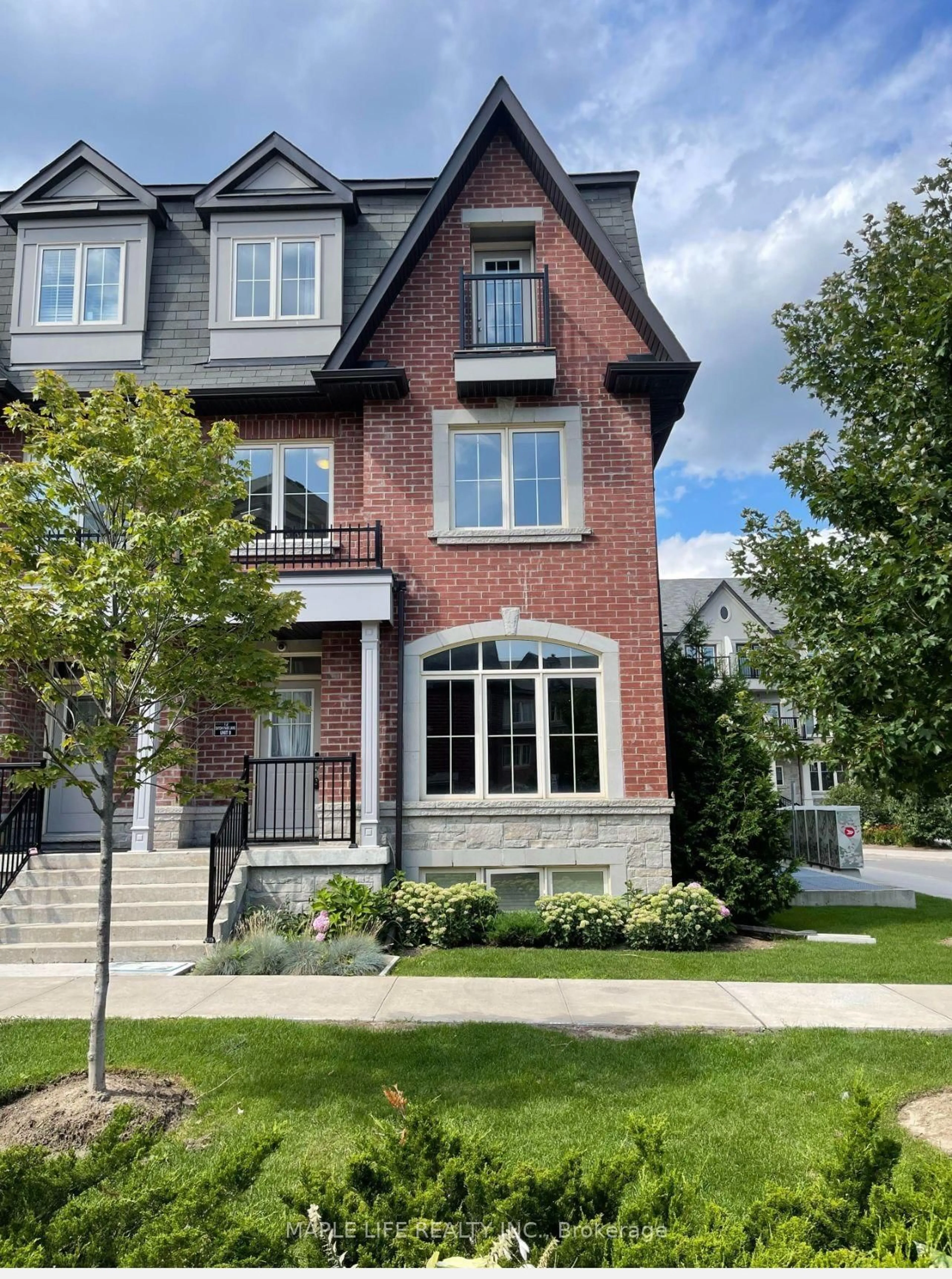 Home with brick exterior material, street for 12 EATON PARK Lane #8, Toronto Ontario M1W 0A5