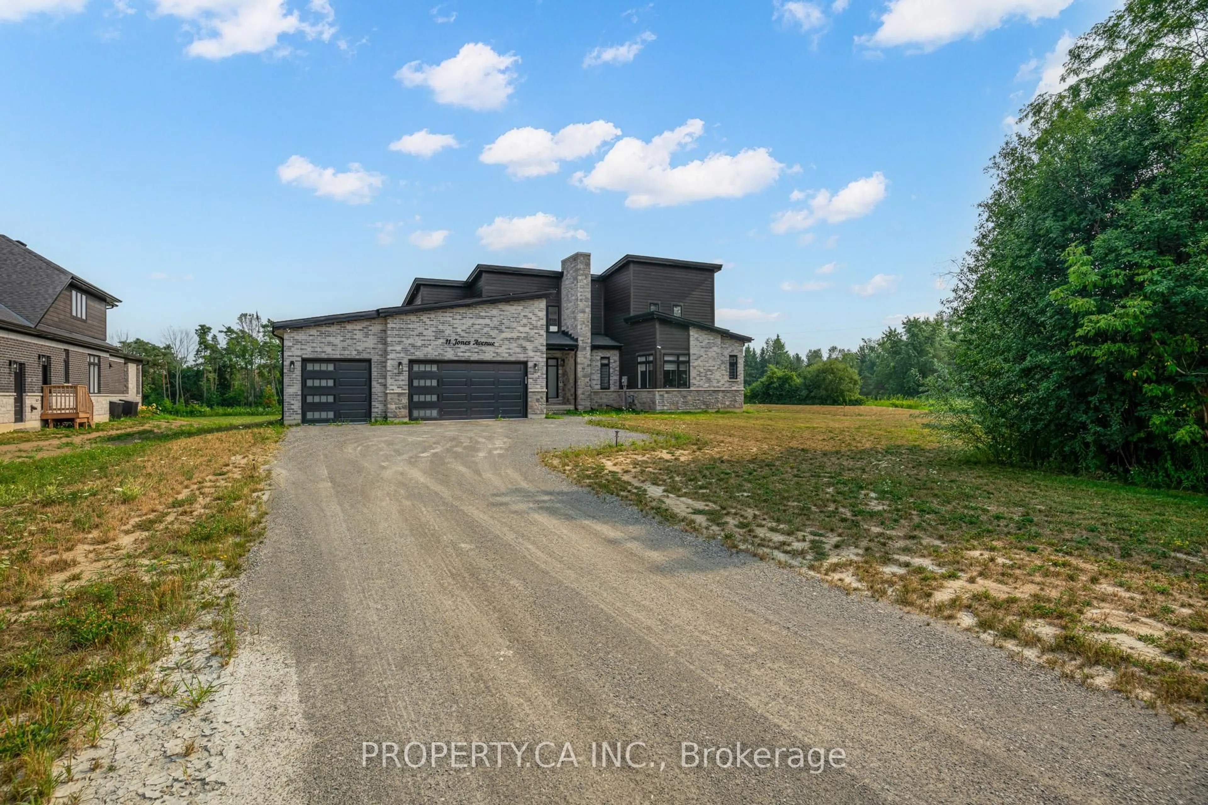 A pic from outside/outdoor area/front of a property/back of a property/a pic from drone, unknown for 11 Jones Ave, Clarington Ontario L0A 1J0