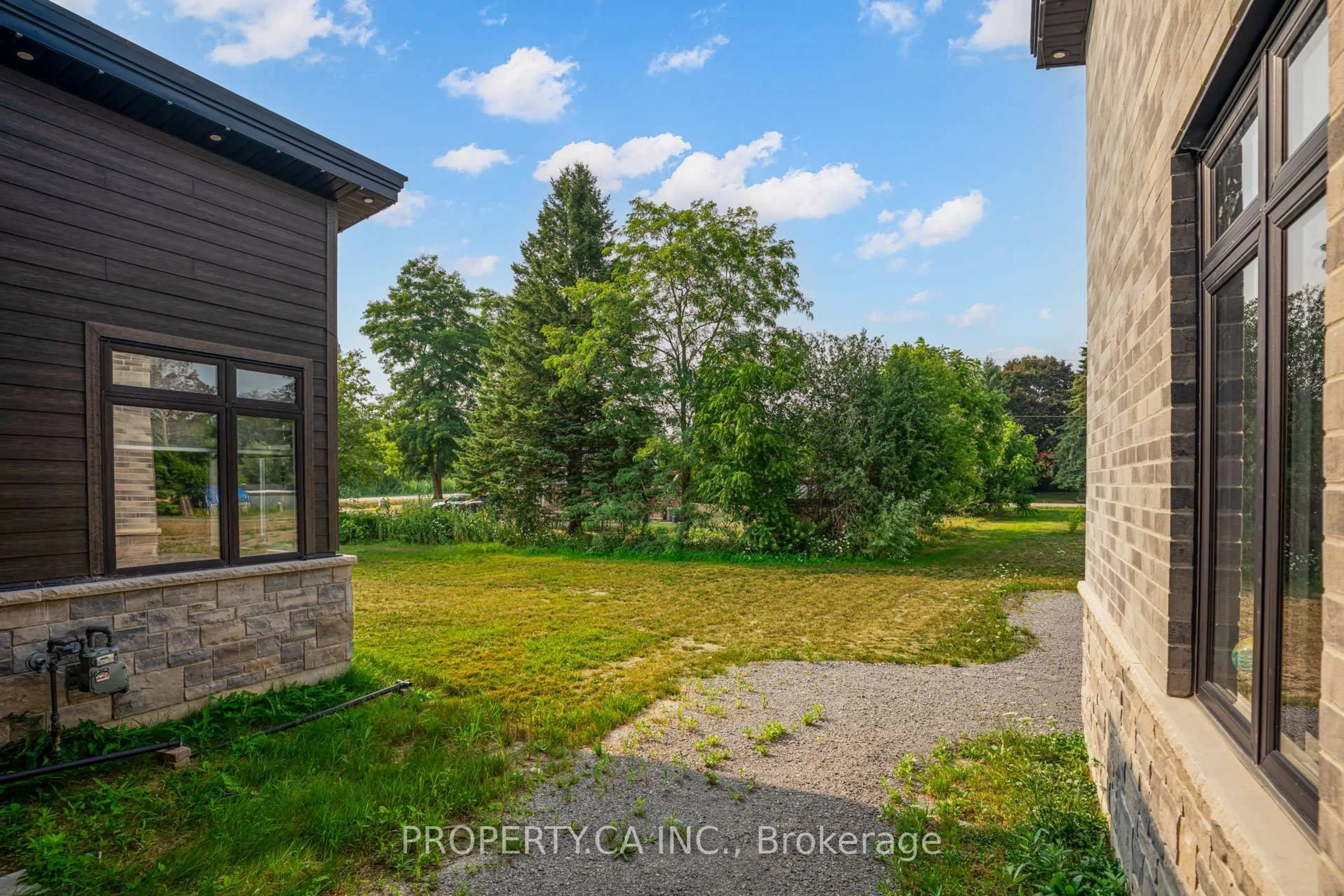 A pic from outside/outdoor area/front of a property/back of a property/a pic from drone, water/lake/river/ocean view for 11 Jones Ave, Clarington Ontario L0A 1J0