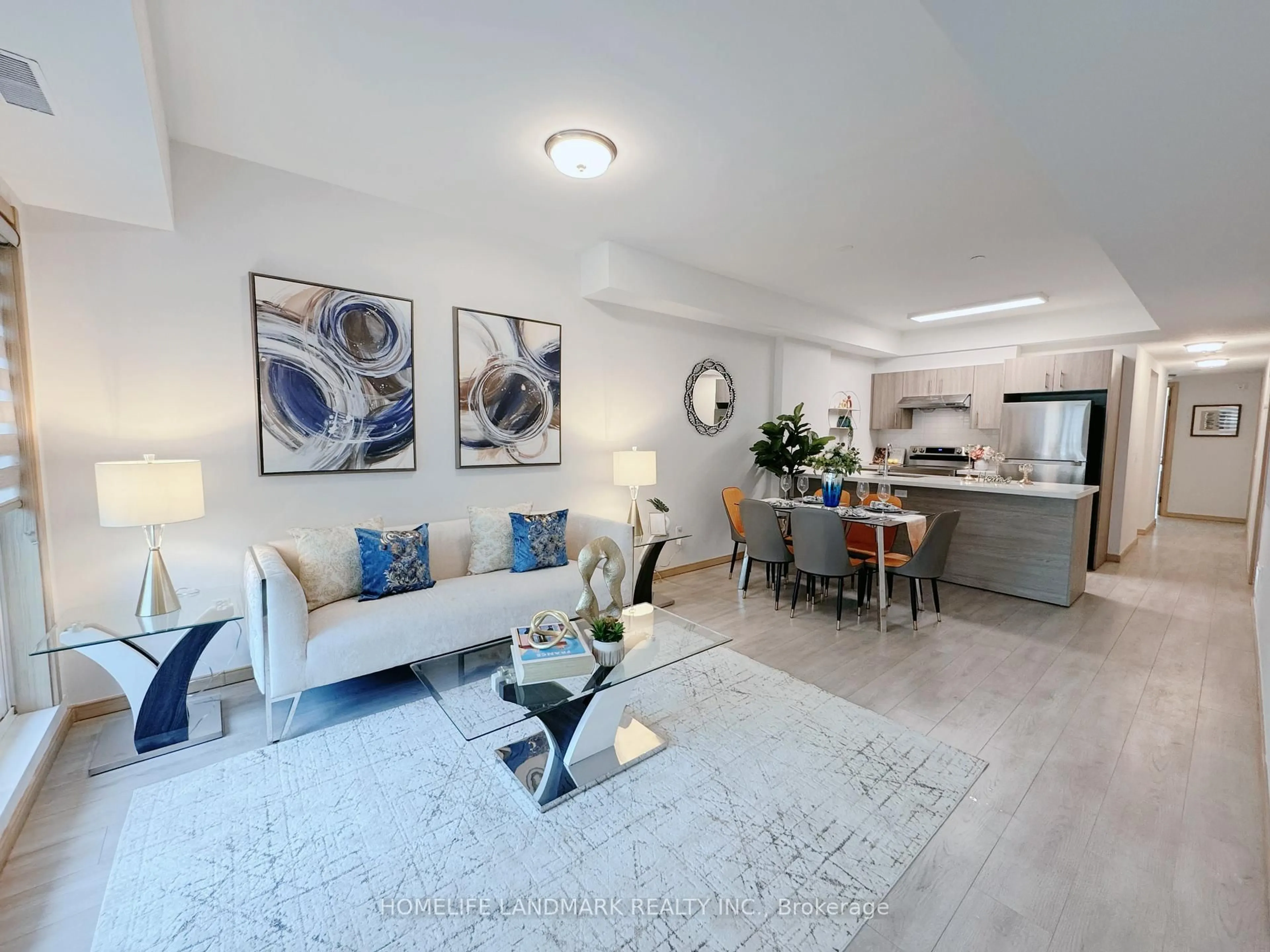 Living room with furniture, unknown for 200 Chester Le Blvd #D207, Toronto Ontario M1W 0A9