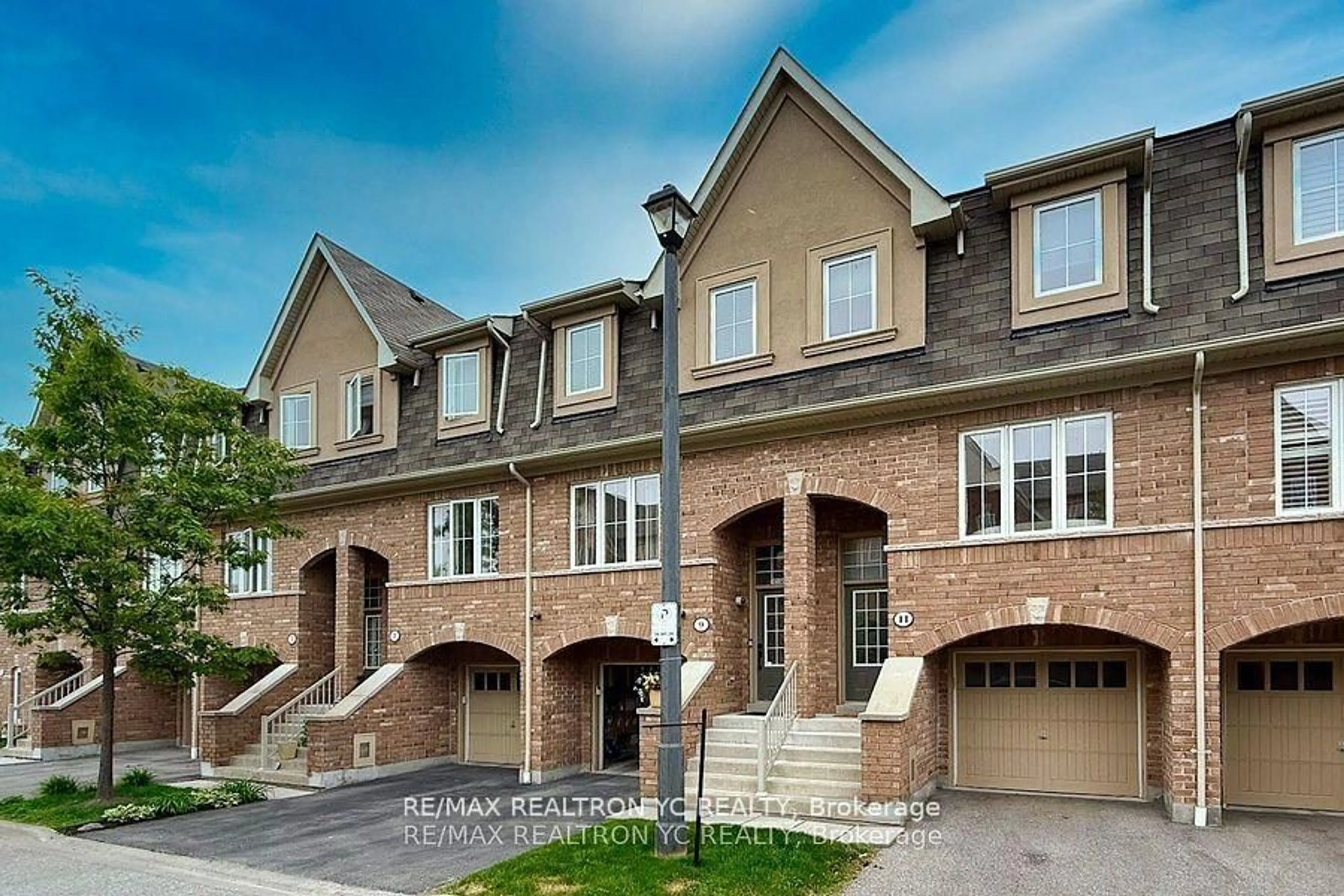 Home with brick exterior material, street for 11 Reevesmere Lane, Ajax Ontario L1Z 0L3