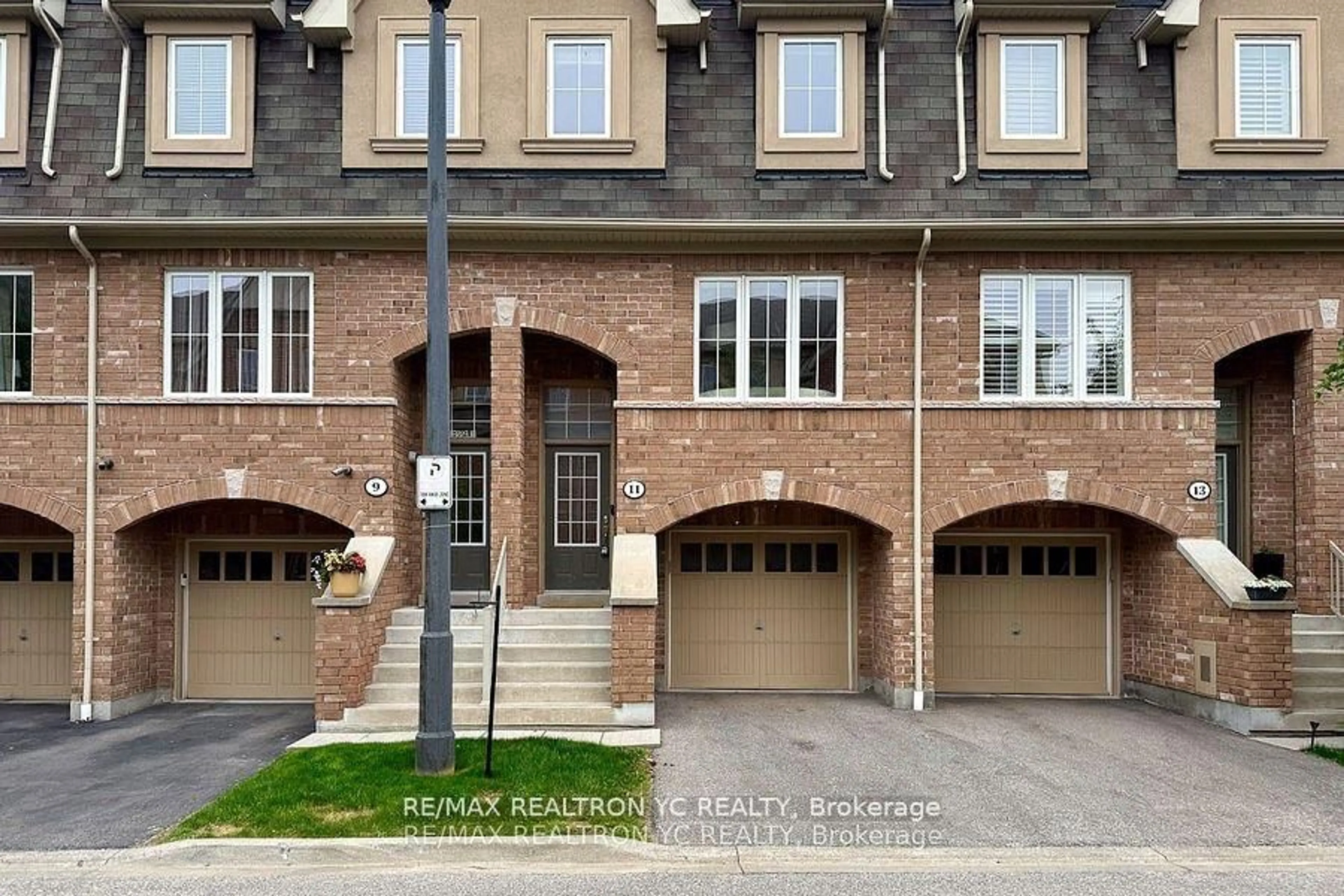 Home with brick exterior material, street for 11 Reevesmere Lane, Ajax Ontario L1Z 0L3