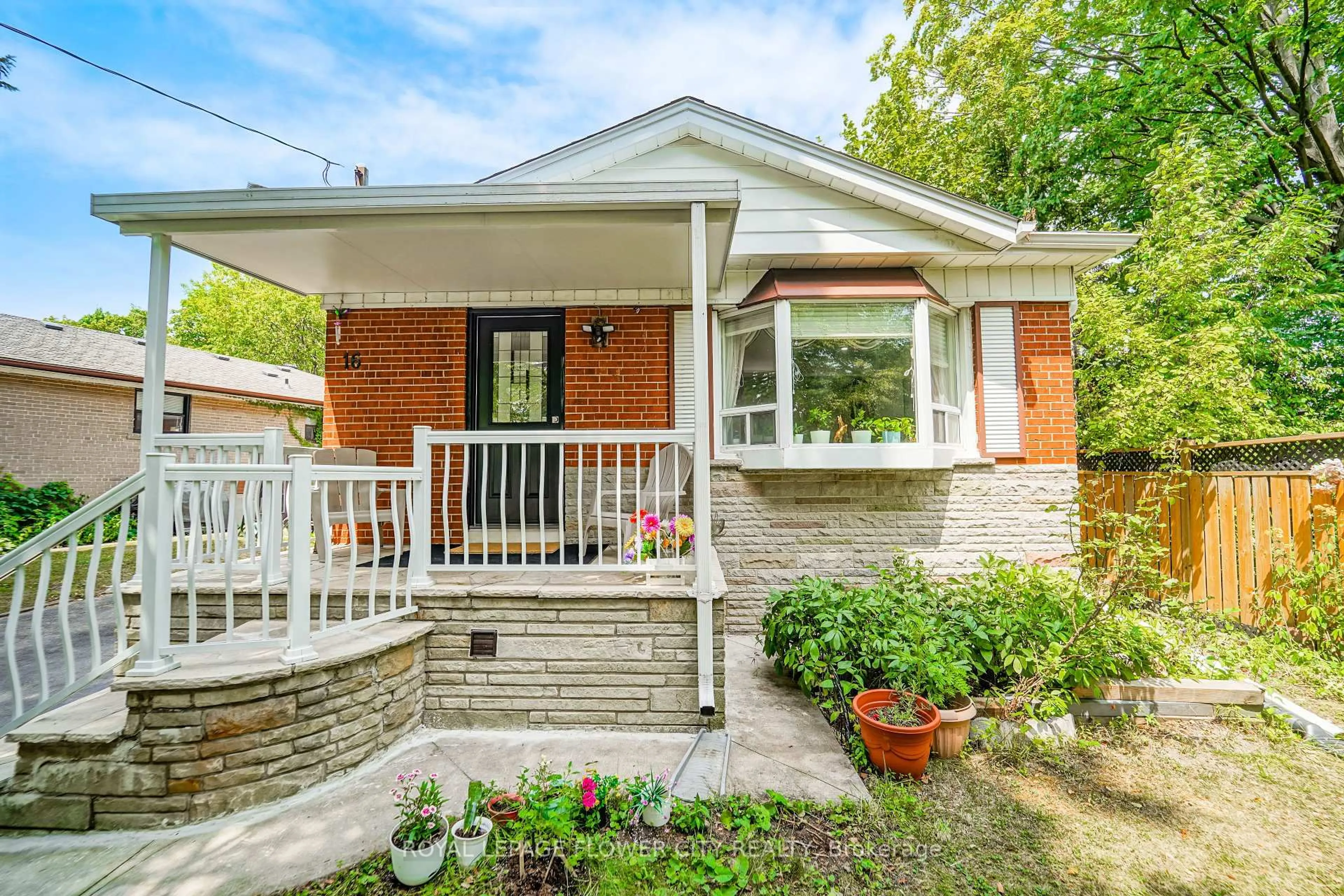 Home with brick exterior material, street for 16 Scranton Rd, Toronto Ontario M1G 1W7