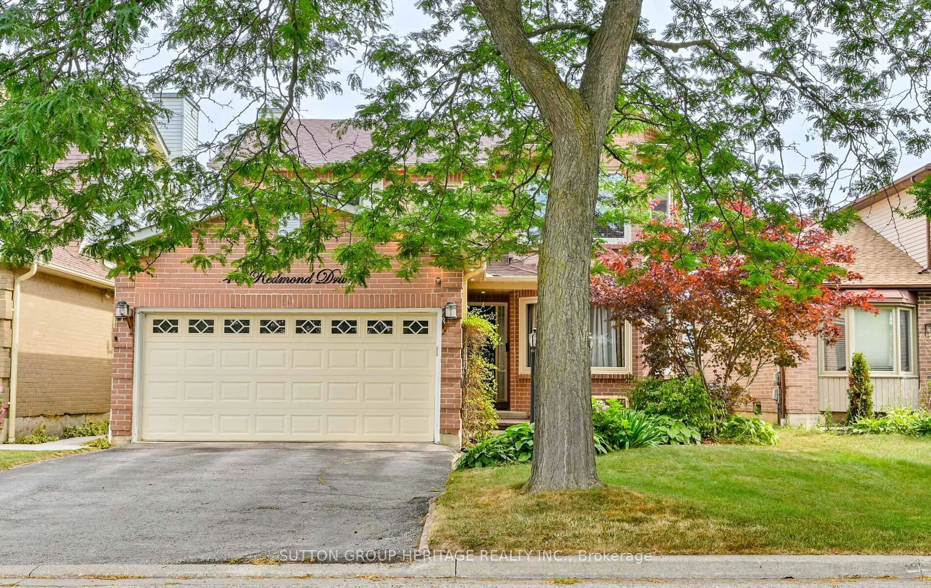 Home with brick exterior material, street for 40 Redmond Dr, Ajax Ontario L1S 6T8