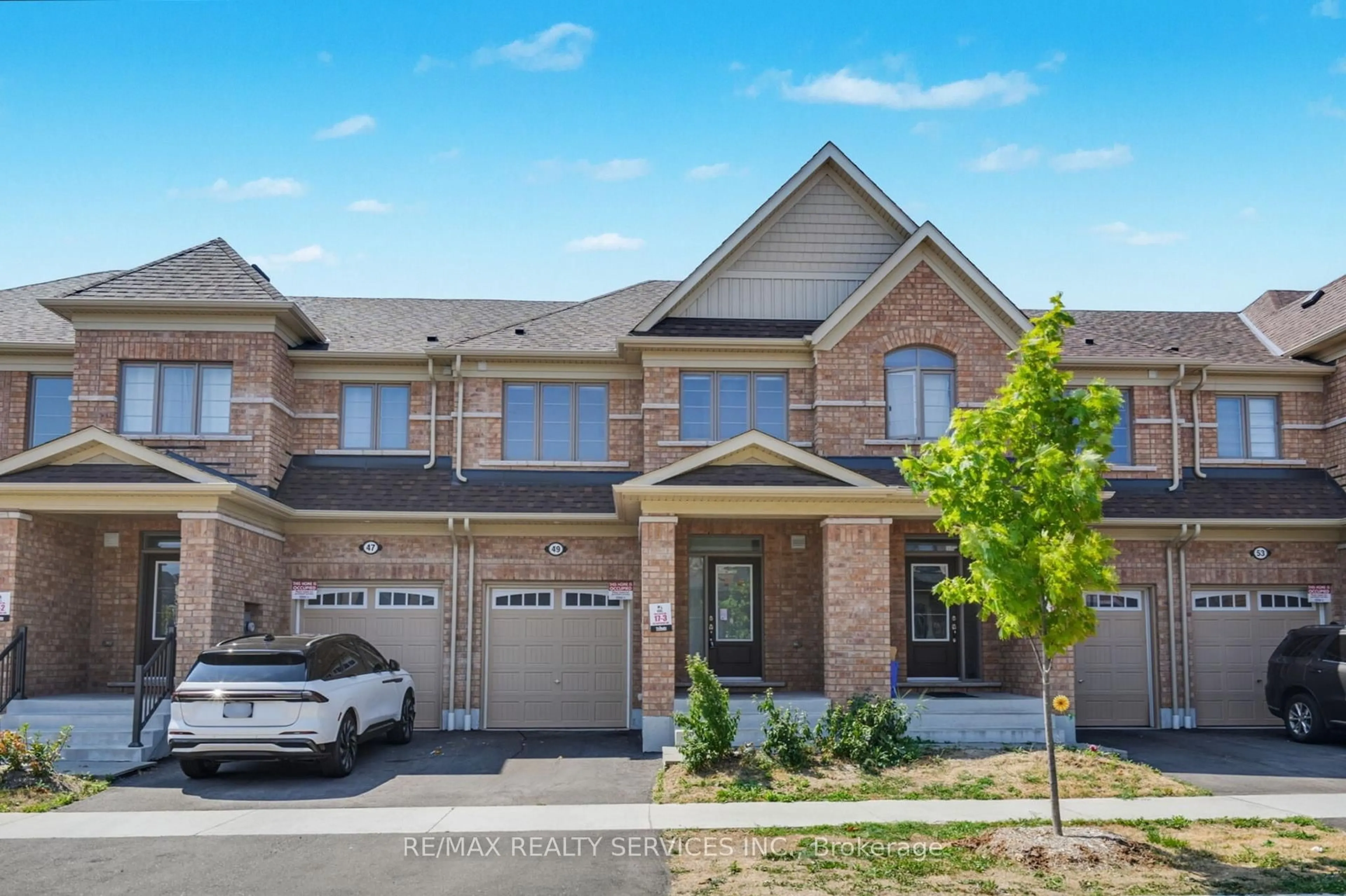 Home with brick exterior material, street for 49 Bayardo Dr, Oshawa Ontario L1L 0V2