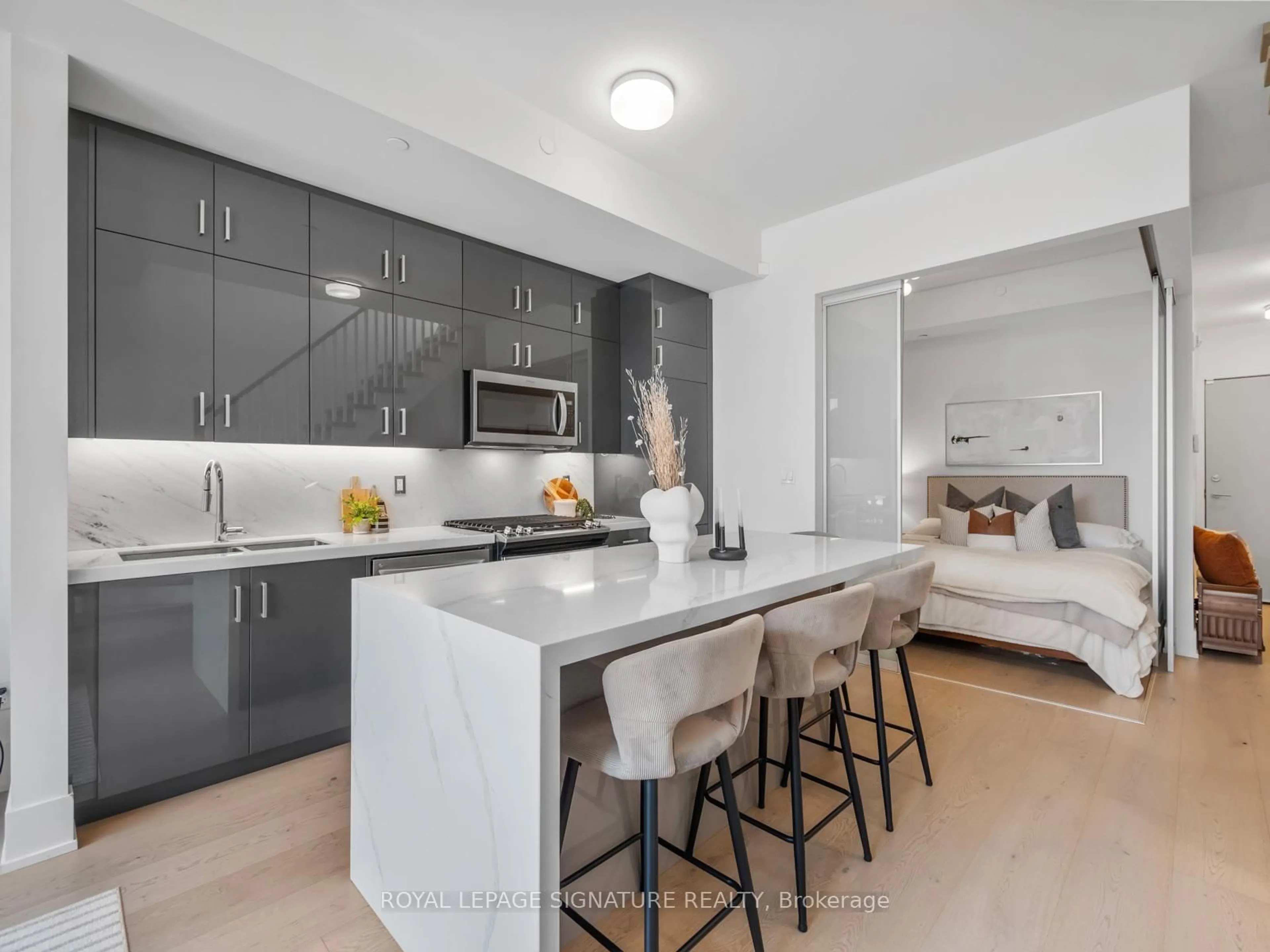 Open concept kitchen, ceramic/tile floor for 14 Dewhurst Blvd #406, Toronto Ontario M4J 3H9
