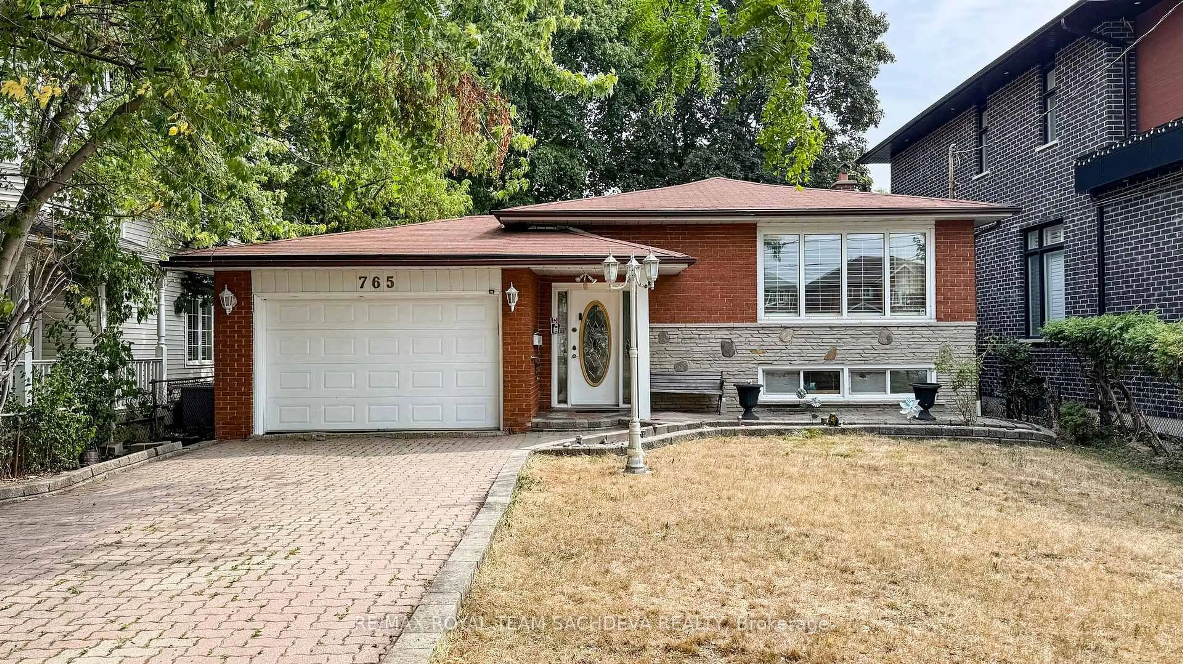 Home with brick exterior material, street for 765 Morrish Rd, Toronto Ontario M1C 1G5