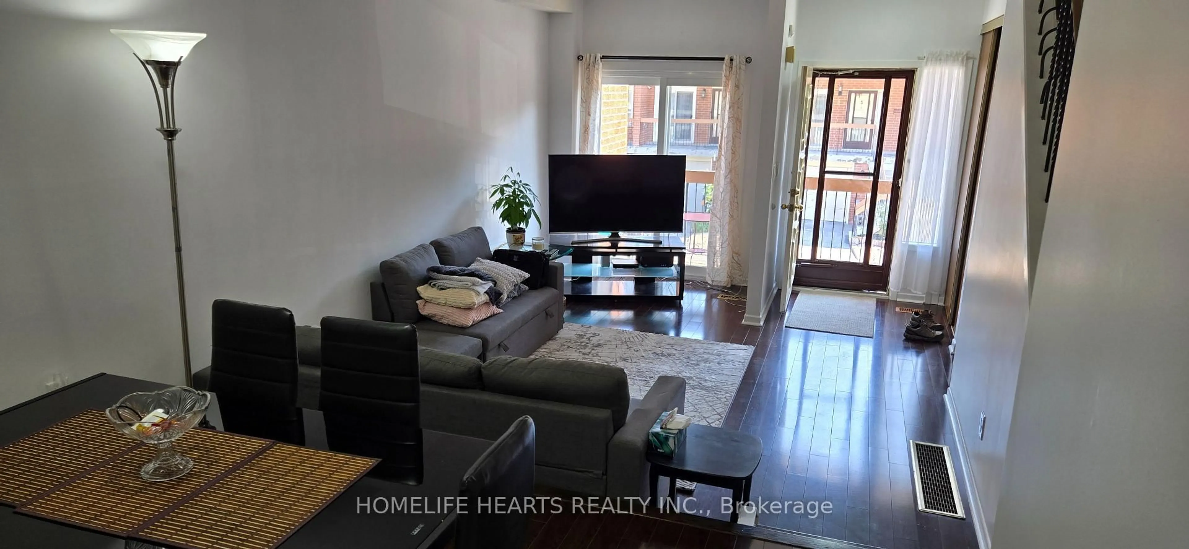 Living room with furniture, unknown for 152 Homestead Rd #24, Toronto Ontario M1E 3S2