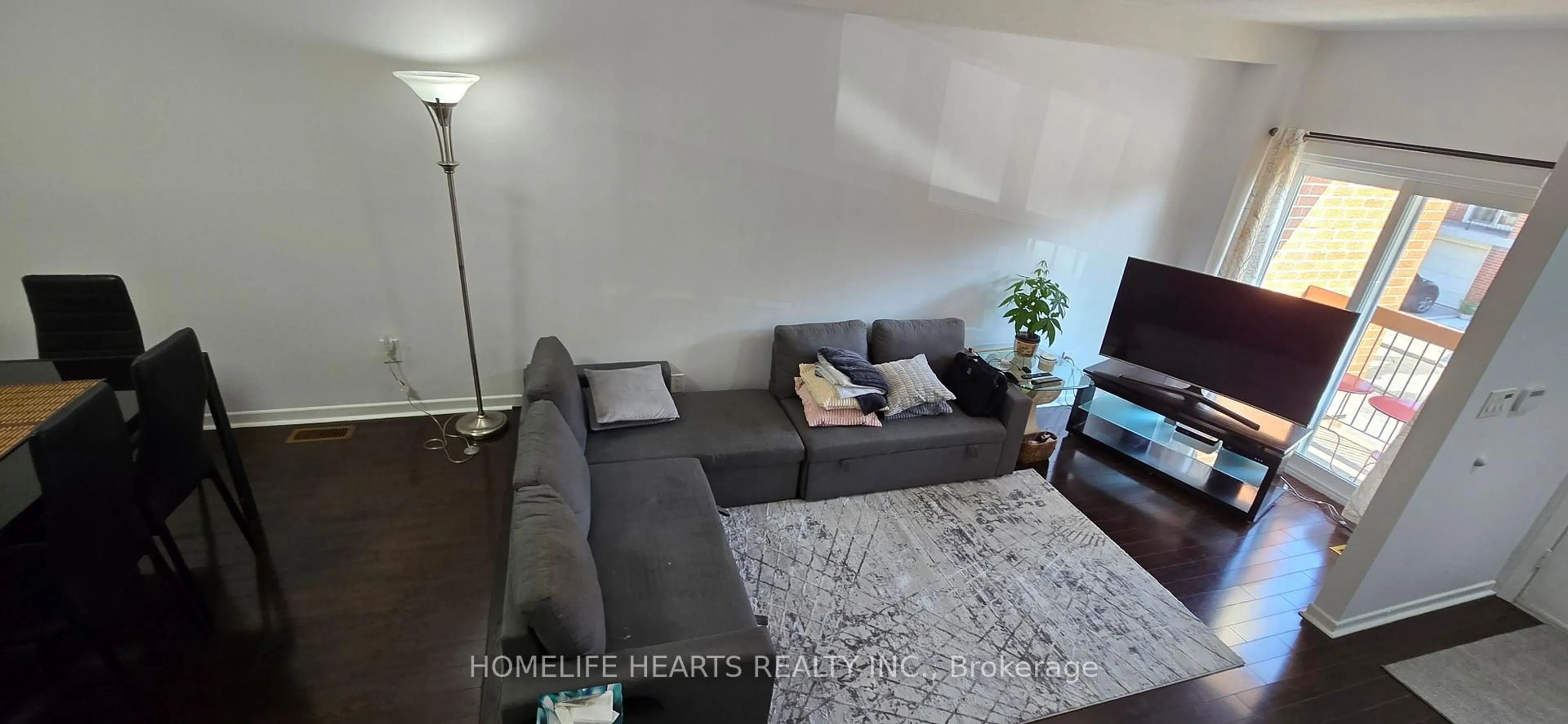 Living room with furniture, unknown for 152 Homestead Rd #24, Toronto Ontario M1E 3S2