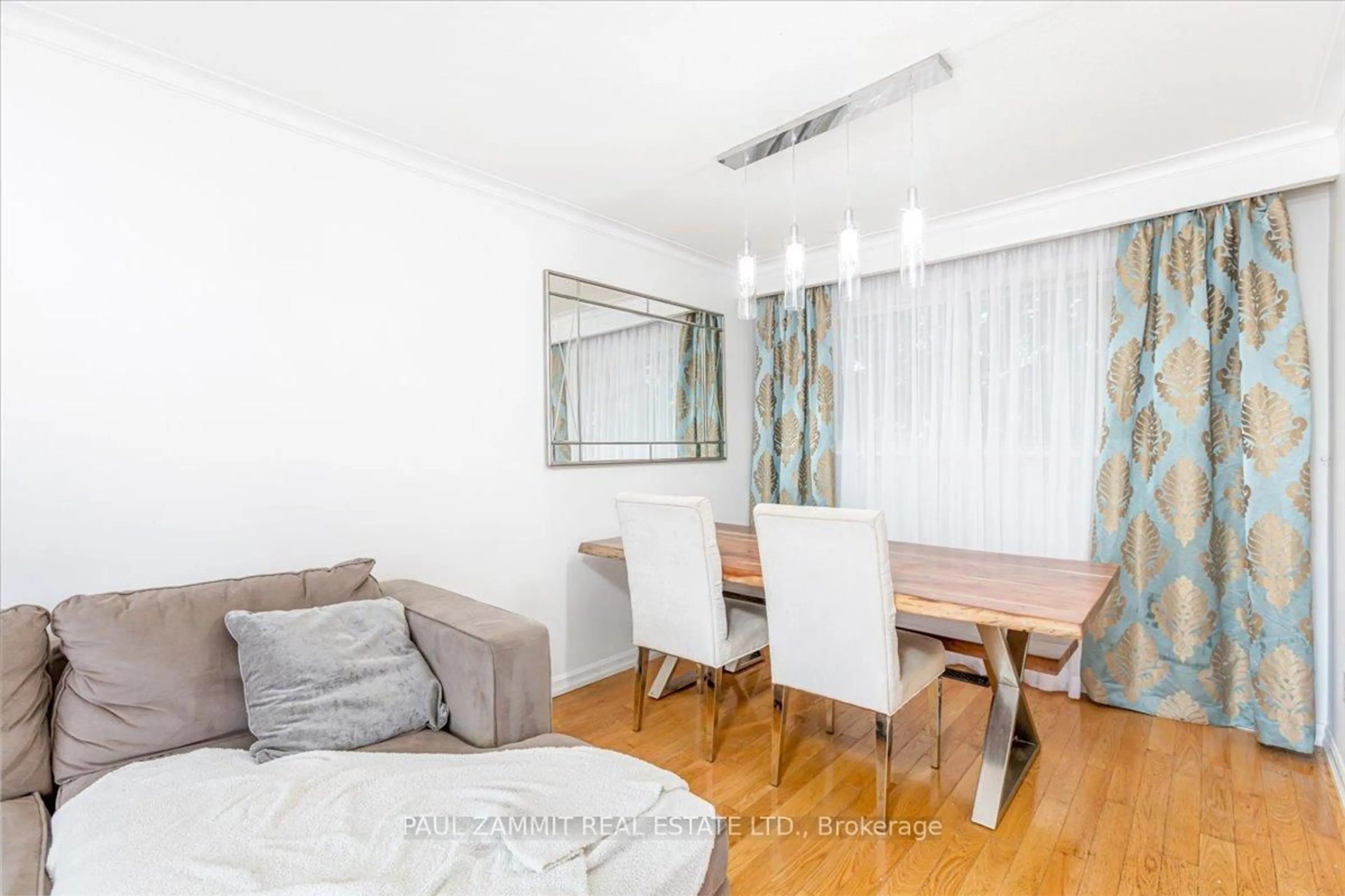 Living room with furniture, wood/laminate floor for 16 Paloma Pl, Toronto Ontario M1J 1P7