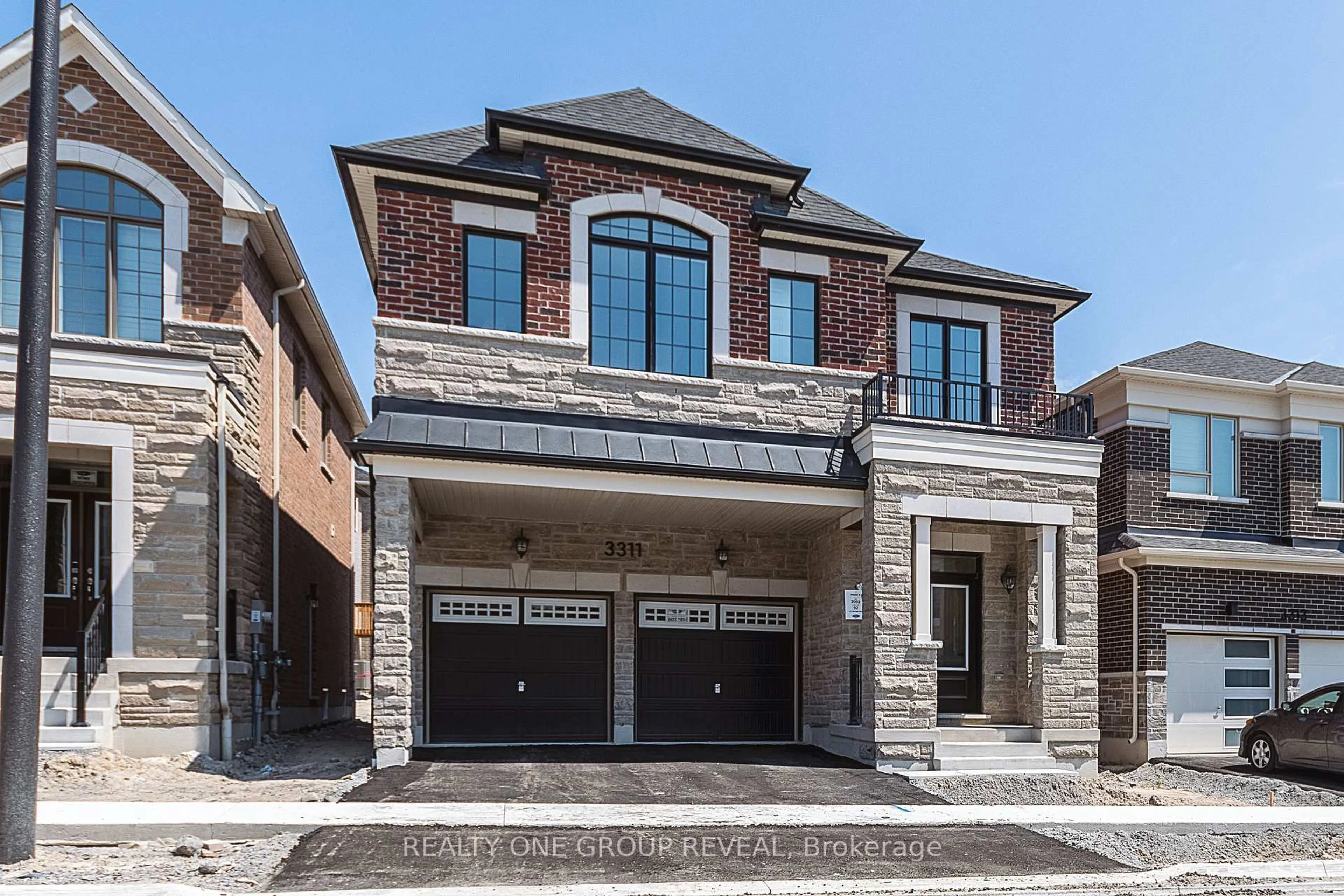 Home with brick exterior material, street for 3311 Marchington Sq, Pickering Ontario L1X 0N1