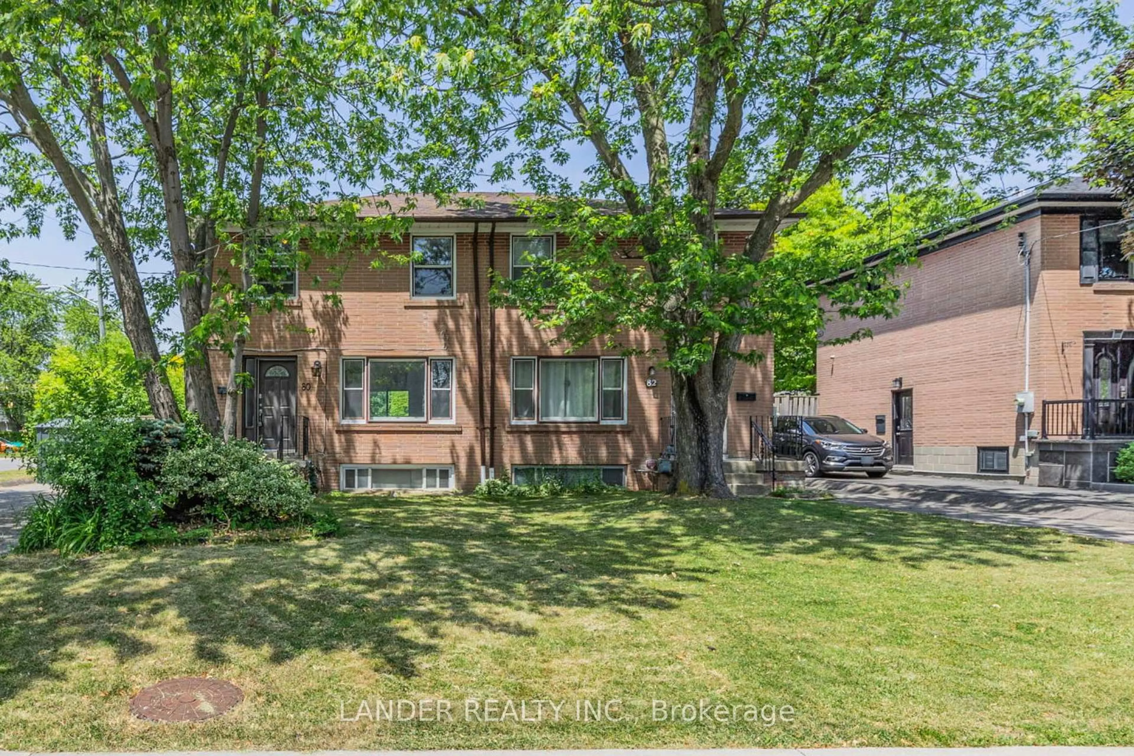Home with brick exterior material, street for 82 Minerva Ave, Toronto Ontario M1M 1V5