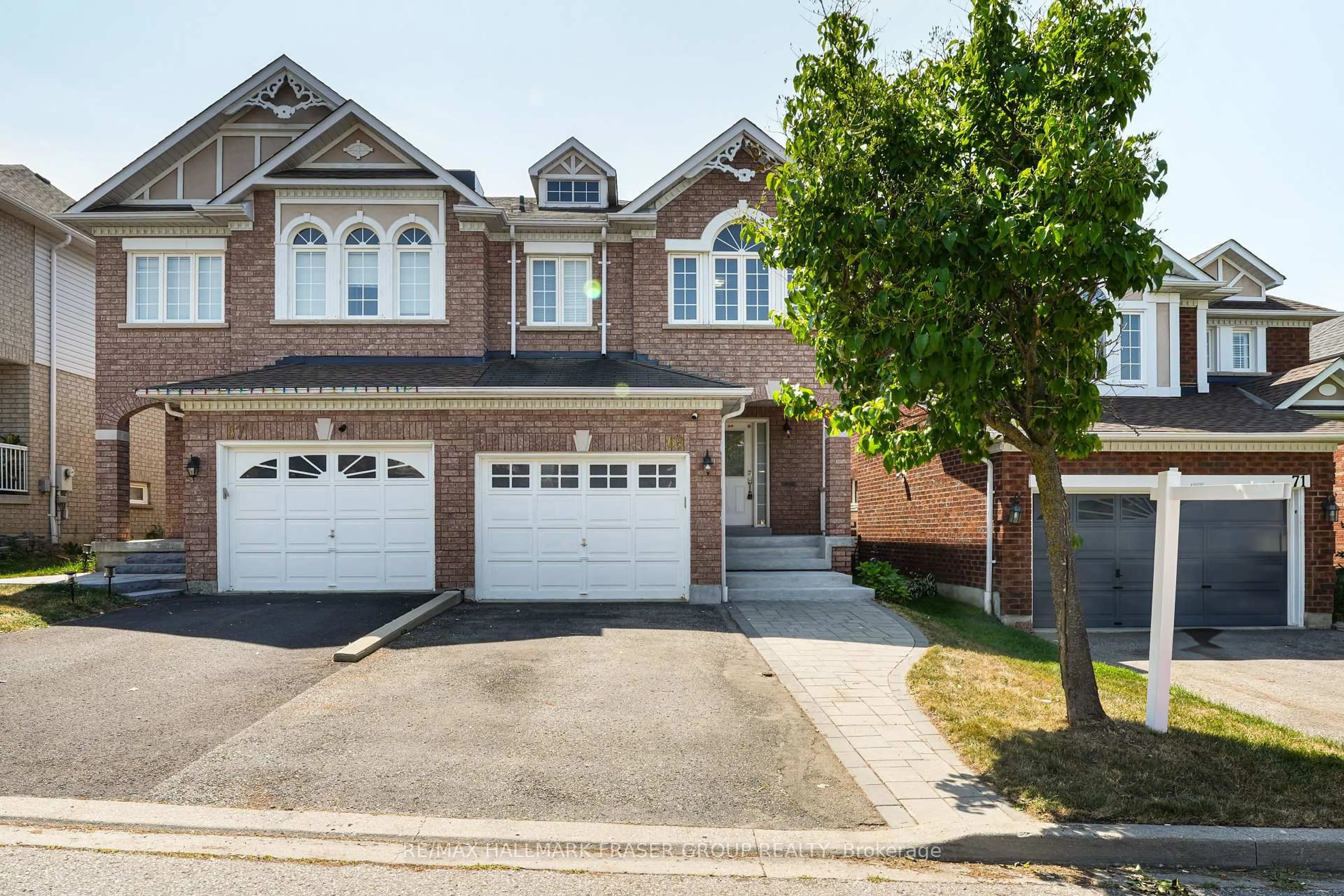 Home with brick exterior material, street for 69 Jonesridge Dr, Ajax Ontario L1T 0B2
