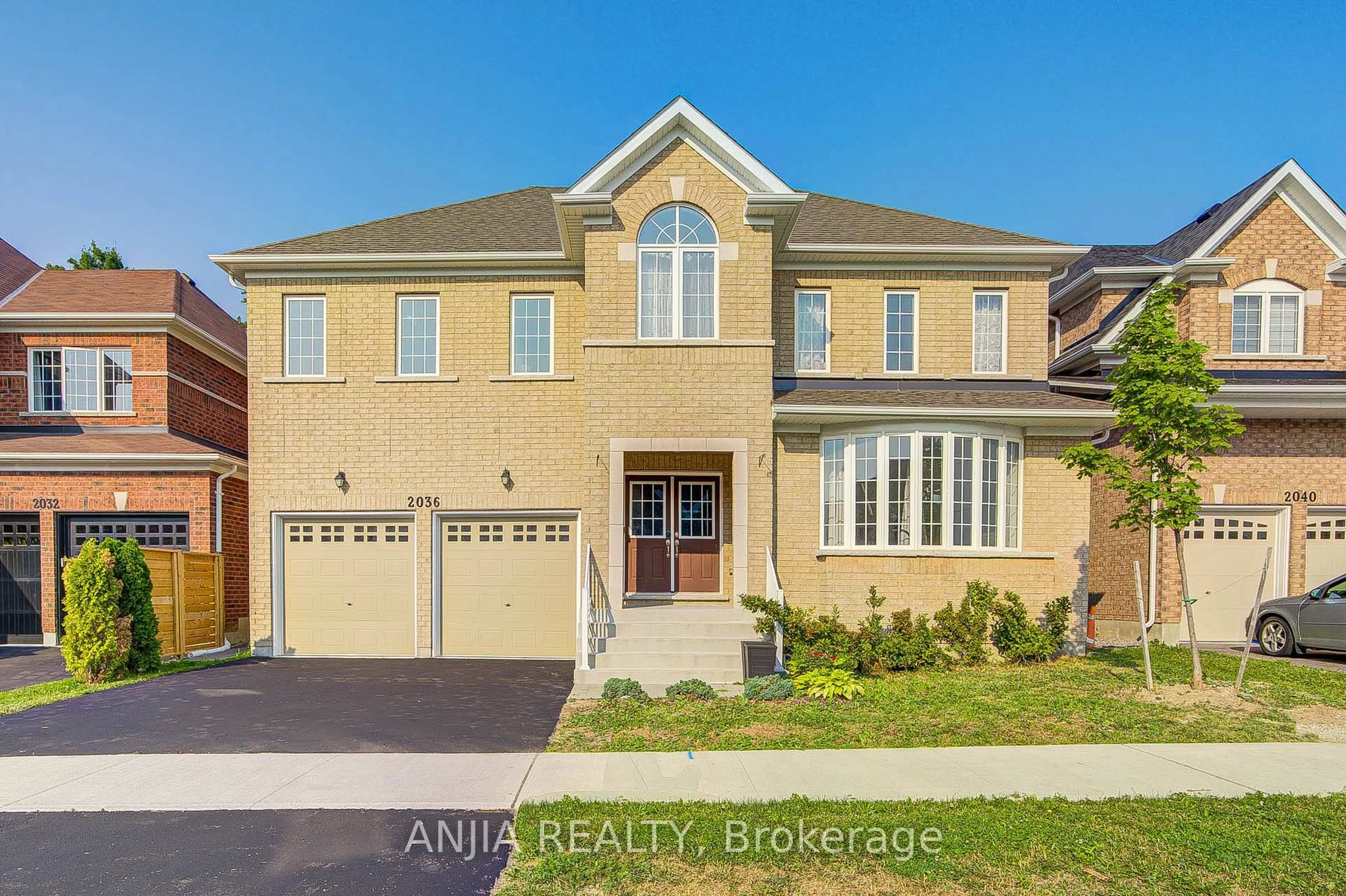 Home with brick exterior material, street for 2036 Kurelo Dr, Oshawa Ontario L1K 0W7