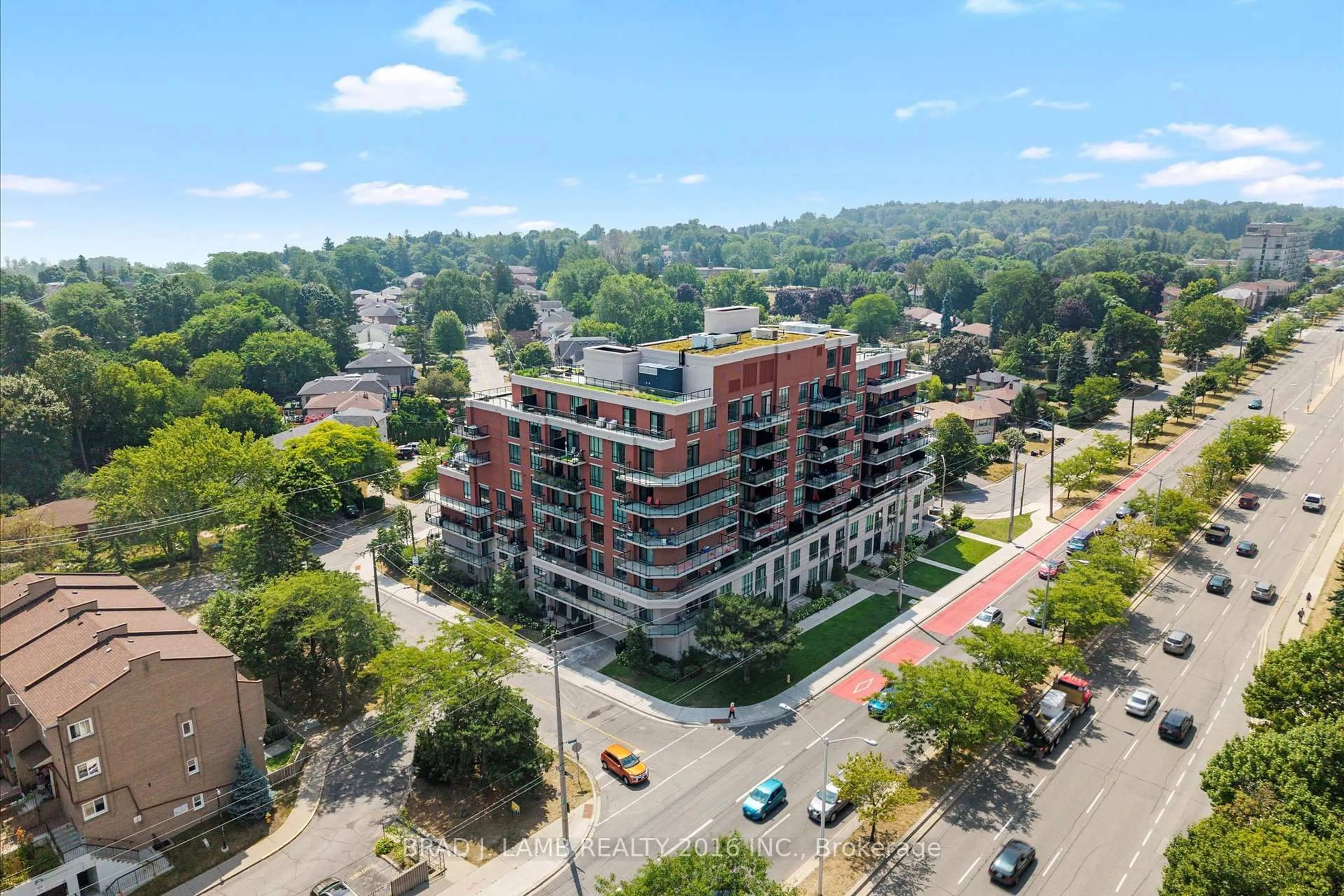 A pic from outside/outdoor area/front of a property/back of a property/a pic from drone, unknown for 3655 Kingston Rd #112, Toronto Ontario M1M 0E2