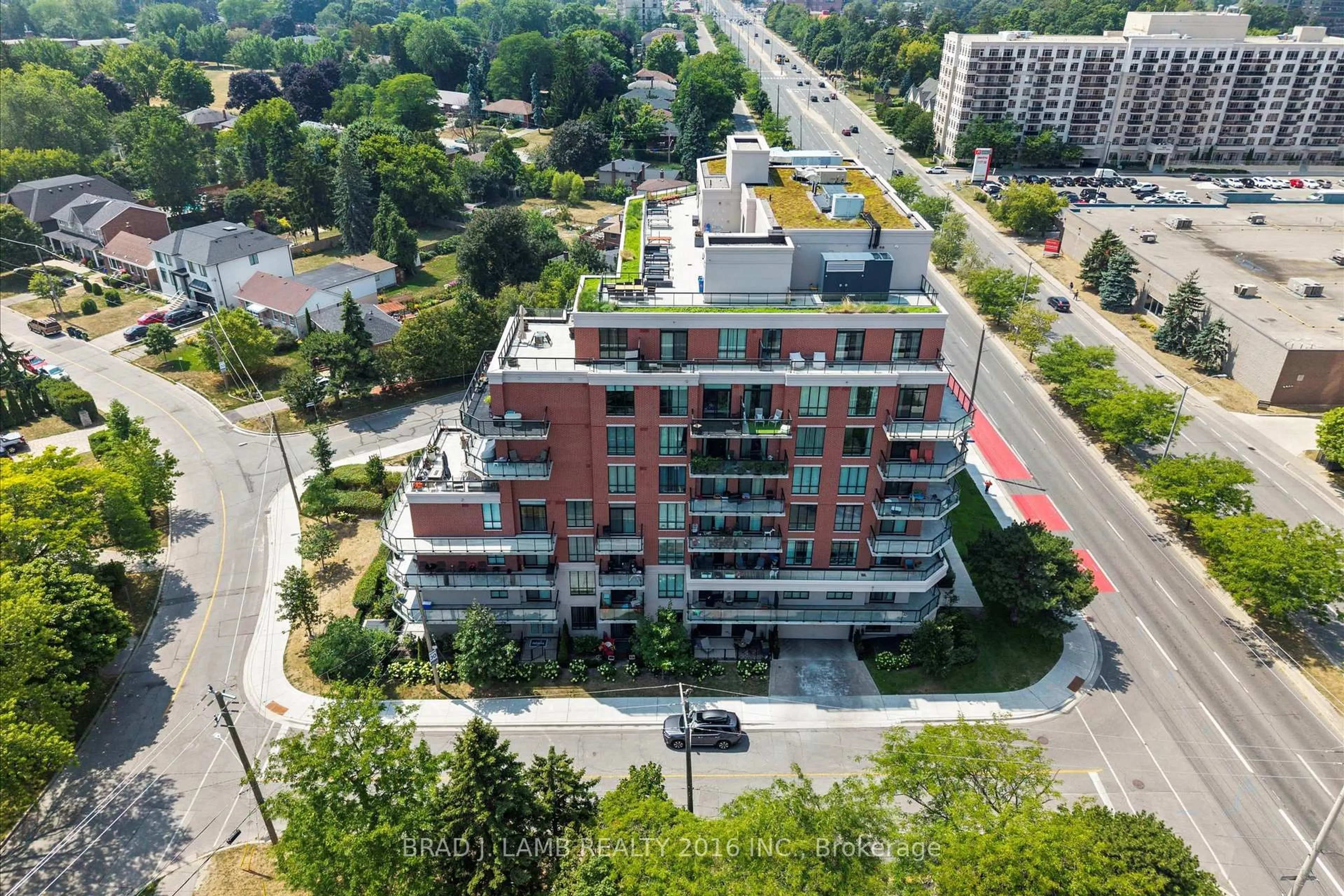 A pic from outside/outdoor area/front of a property/back of a property/a pic from drone, city buildings view from balcony for 3655 Kingston Rd #112, Toronto Ontario M1M 0E2