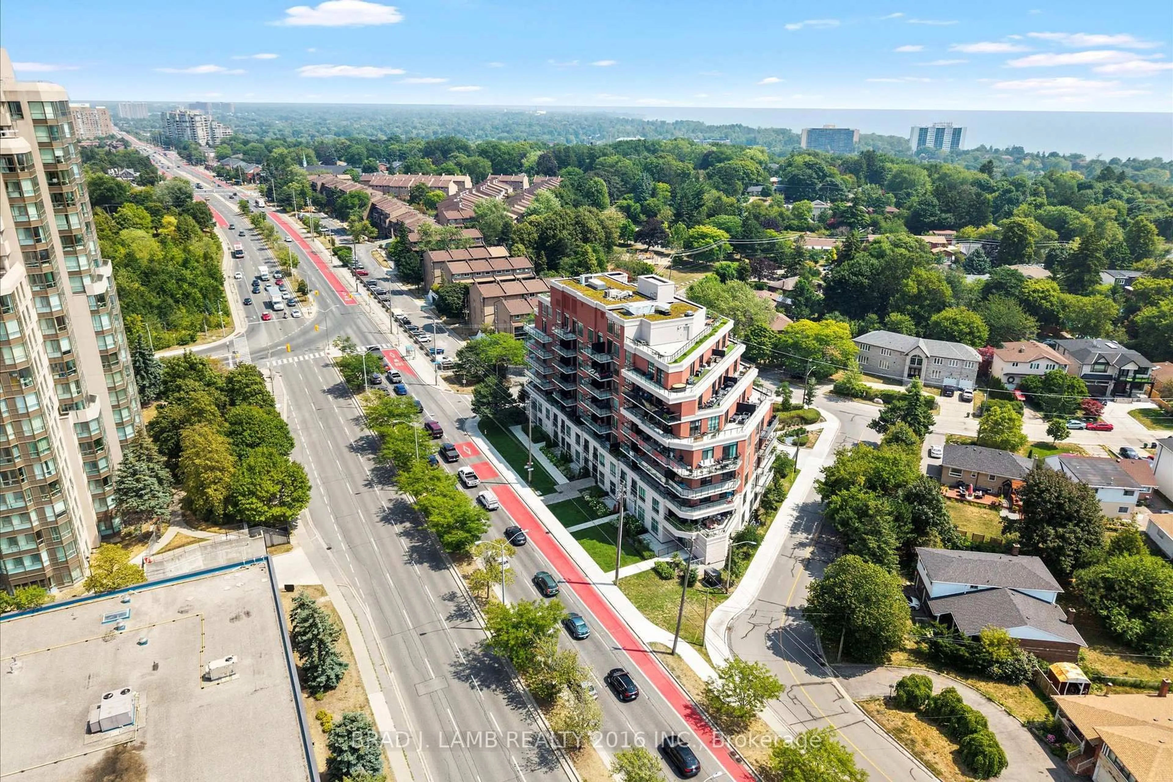 A pic from outside/outdoor area/front of a property/back of a property/a pic from drone, unknown for 3655 Kingston Rd #112, Toronto Ontario M1M 0E2
