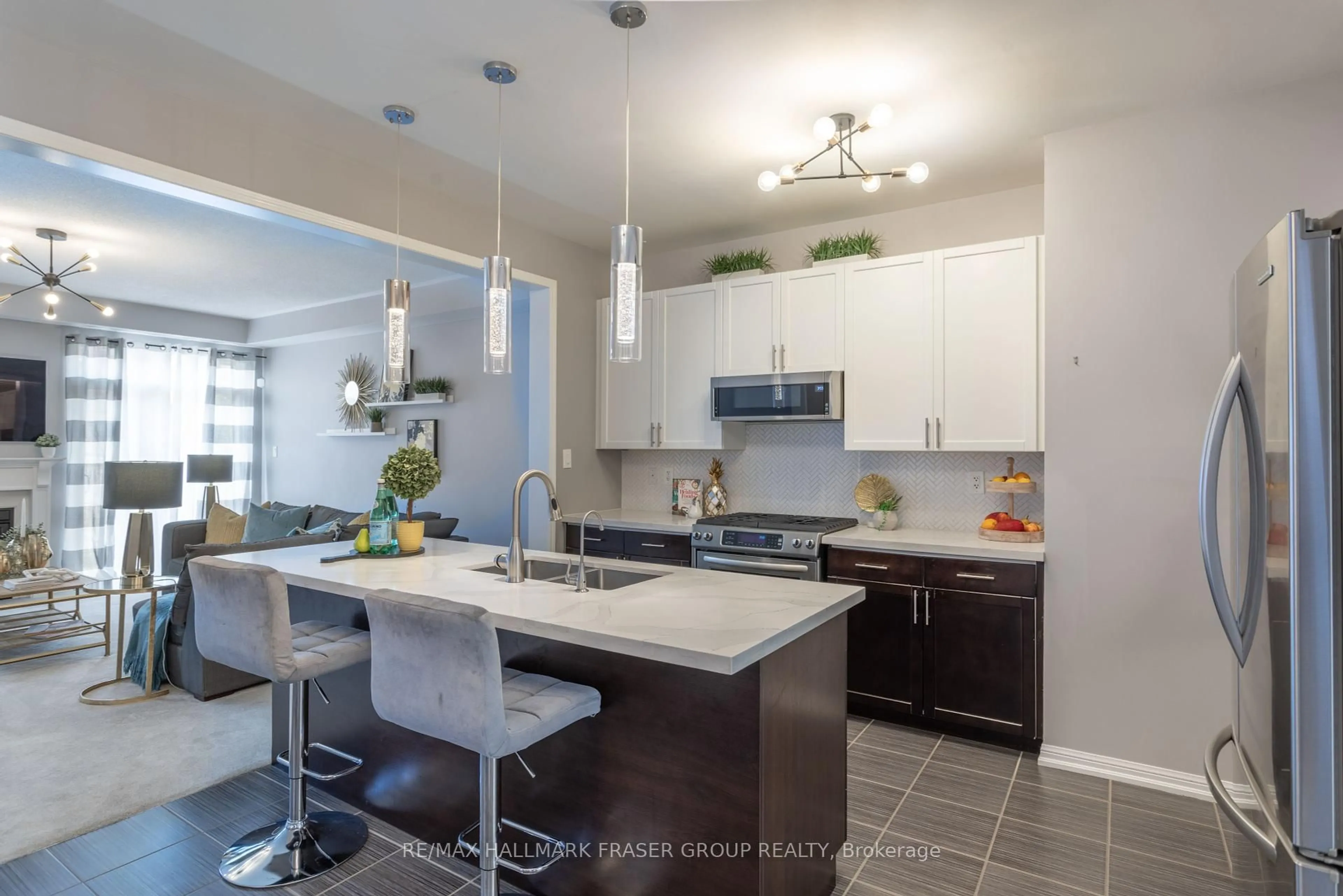 Open concept kitchen, ceramic/tile floor for 16 Powlesland St, Ajax Ontario L1T 0L7