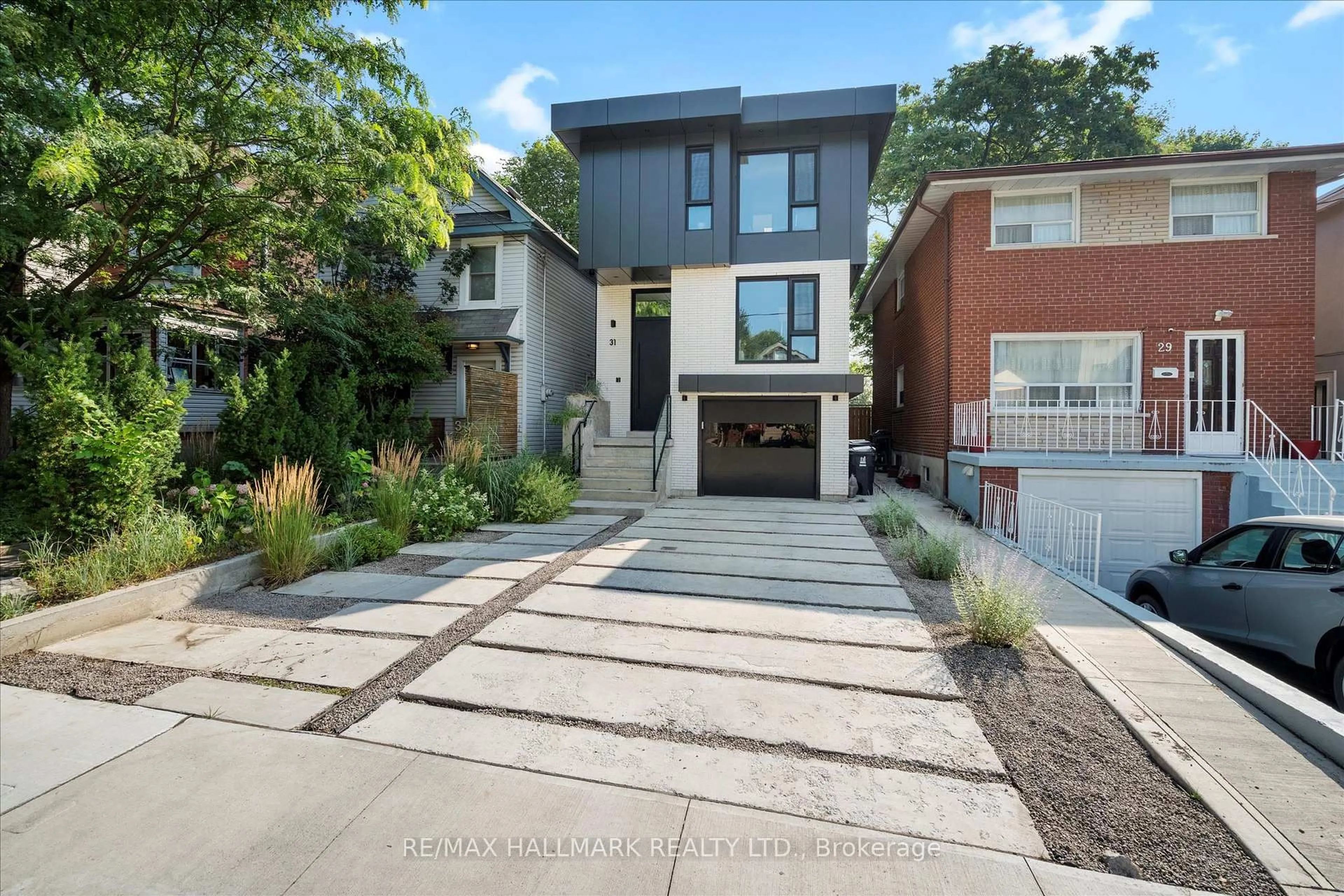 Home with brick exterior material, street for 31 Redwood Ave, Toronto Ontario M4L 2S5