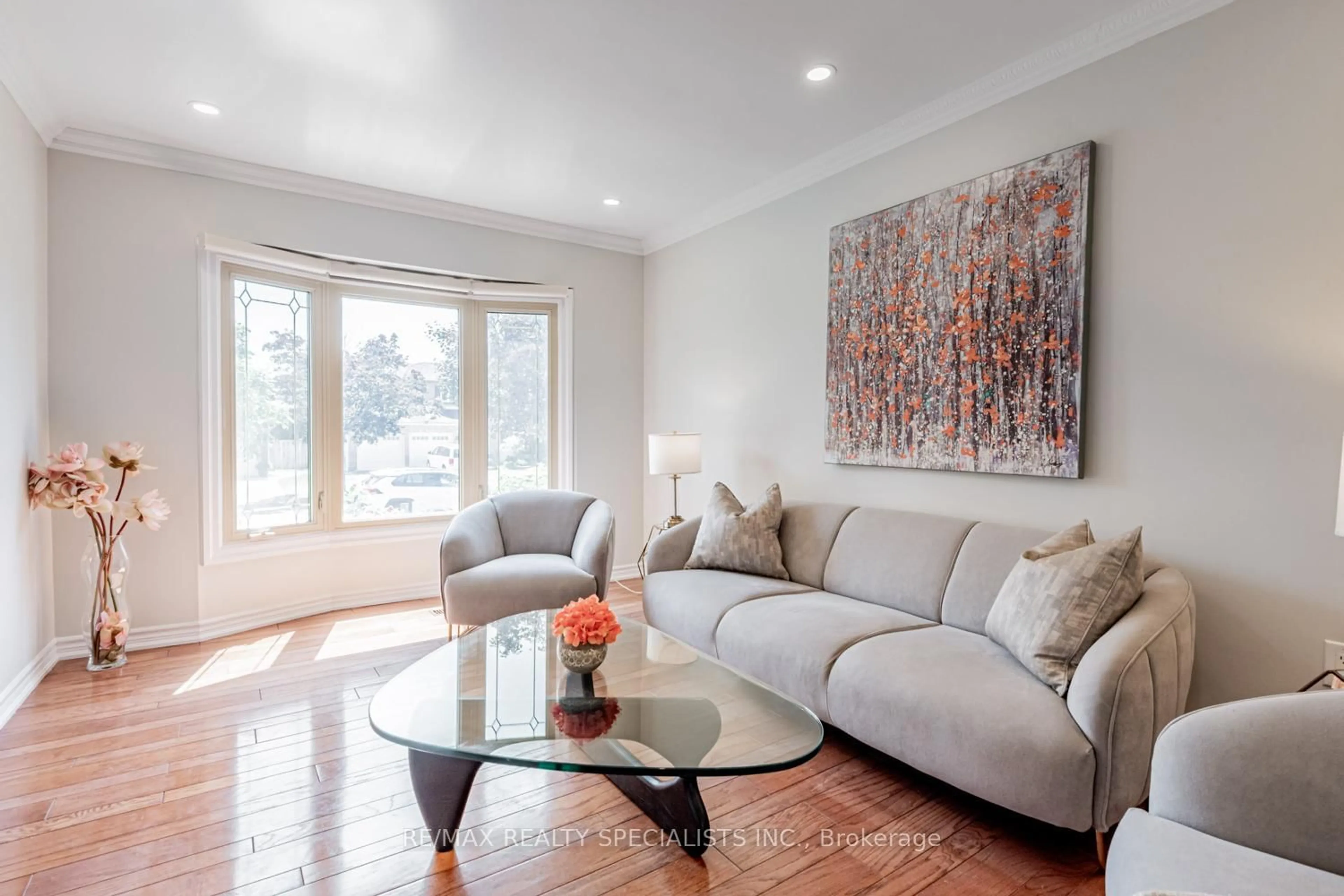 Living room with furniture, wood/laminate floor for 42 Resnik Dr, Clarington Ontario L1B 1K2