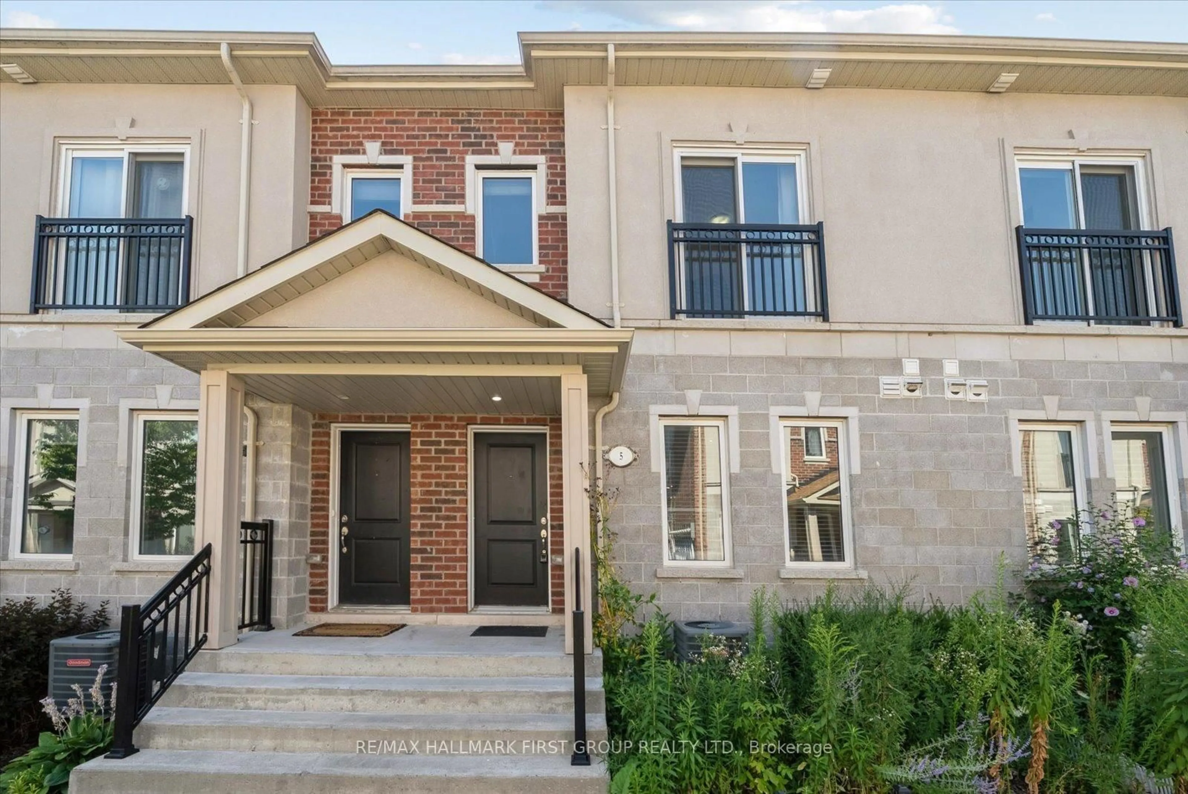 Home with brick exterior material, street for 1060 St. Hilda's Way #5, Whitby Ontario L1N 0L3