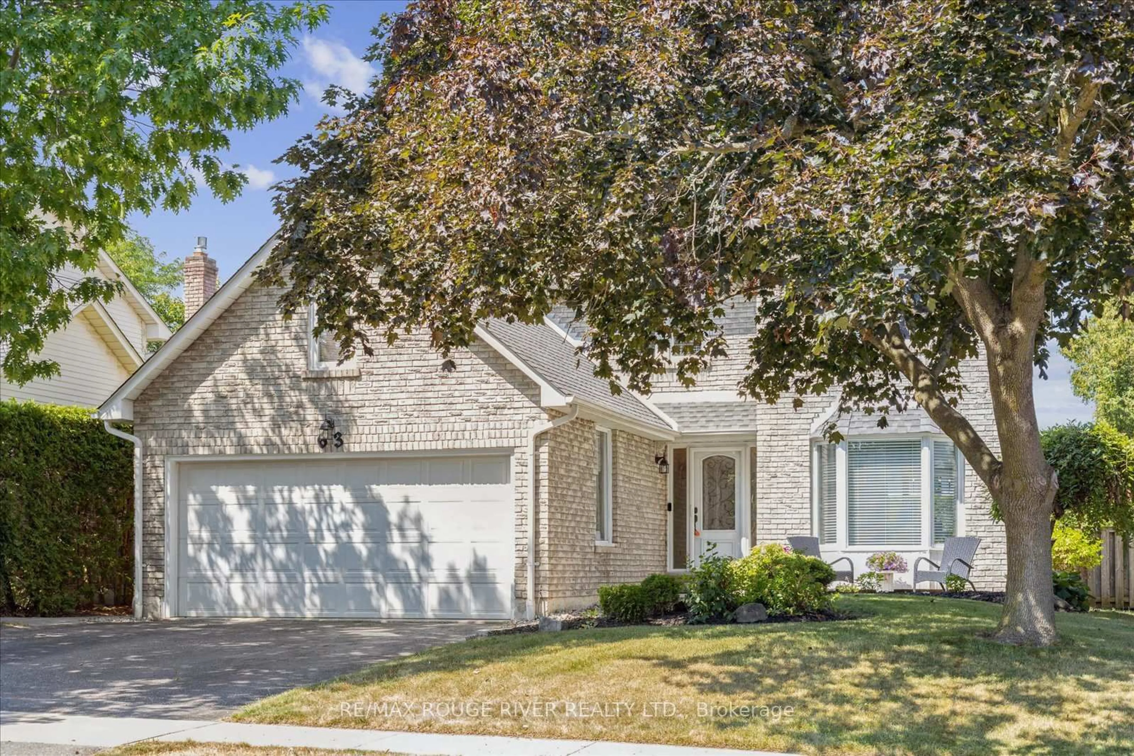 Home with vinyl exterior material, street for 63 Canadians Oaks Dr, Whitby Ontario L1N 6W9
