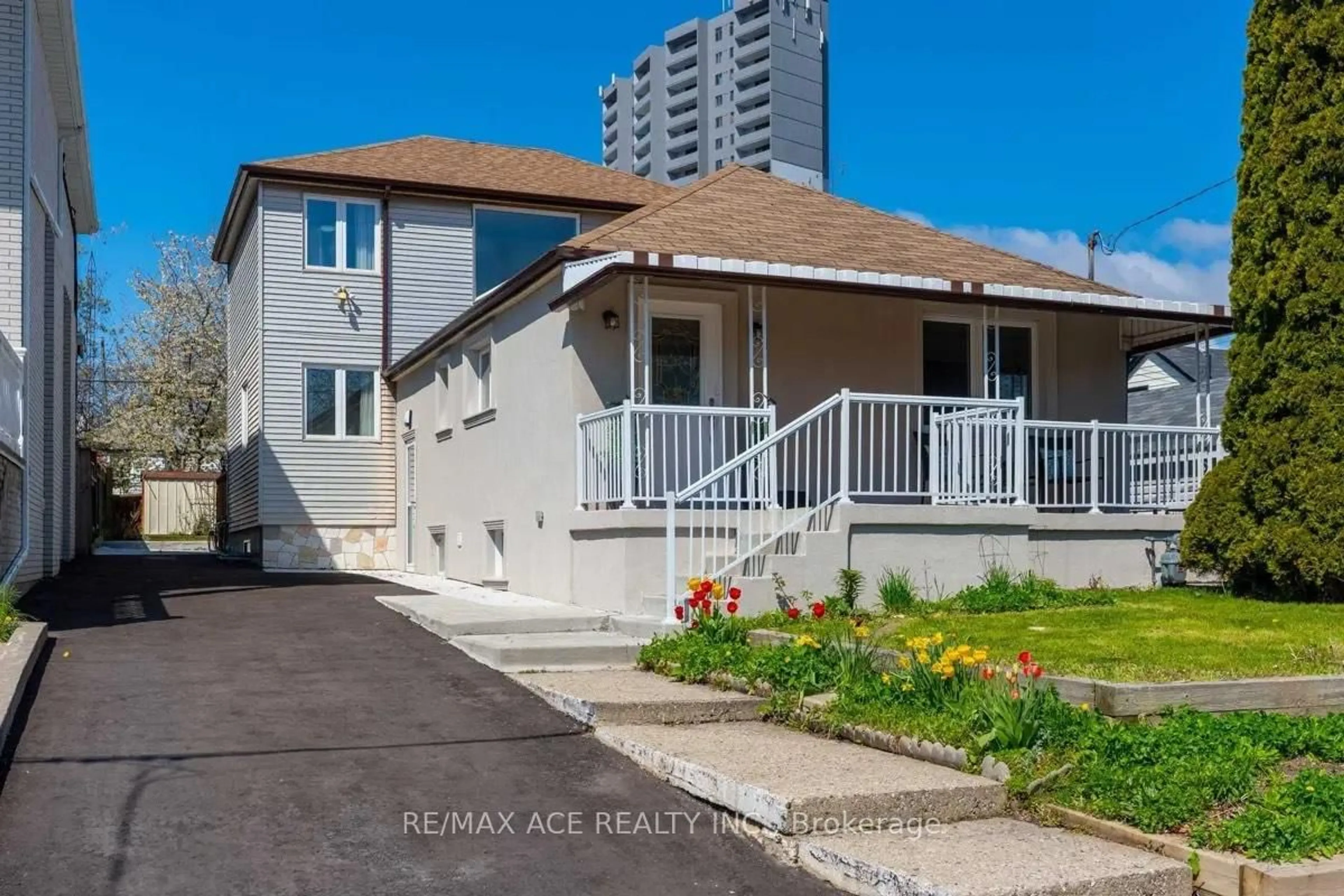 Home with vinyl exterior material, street for 22 Elba Ave, Toronto Ontario M1L 4E8
