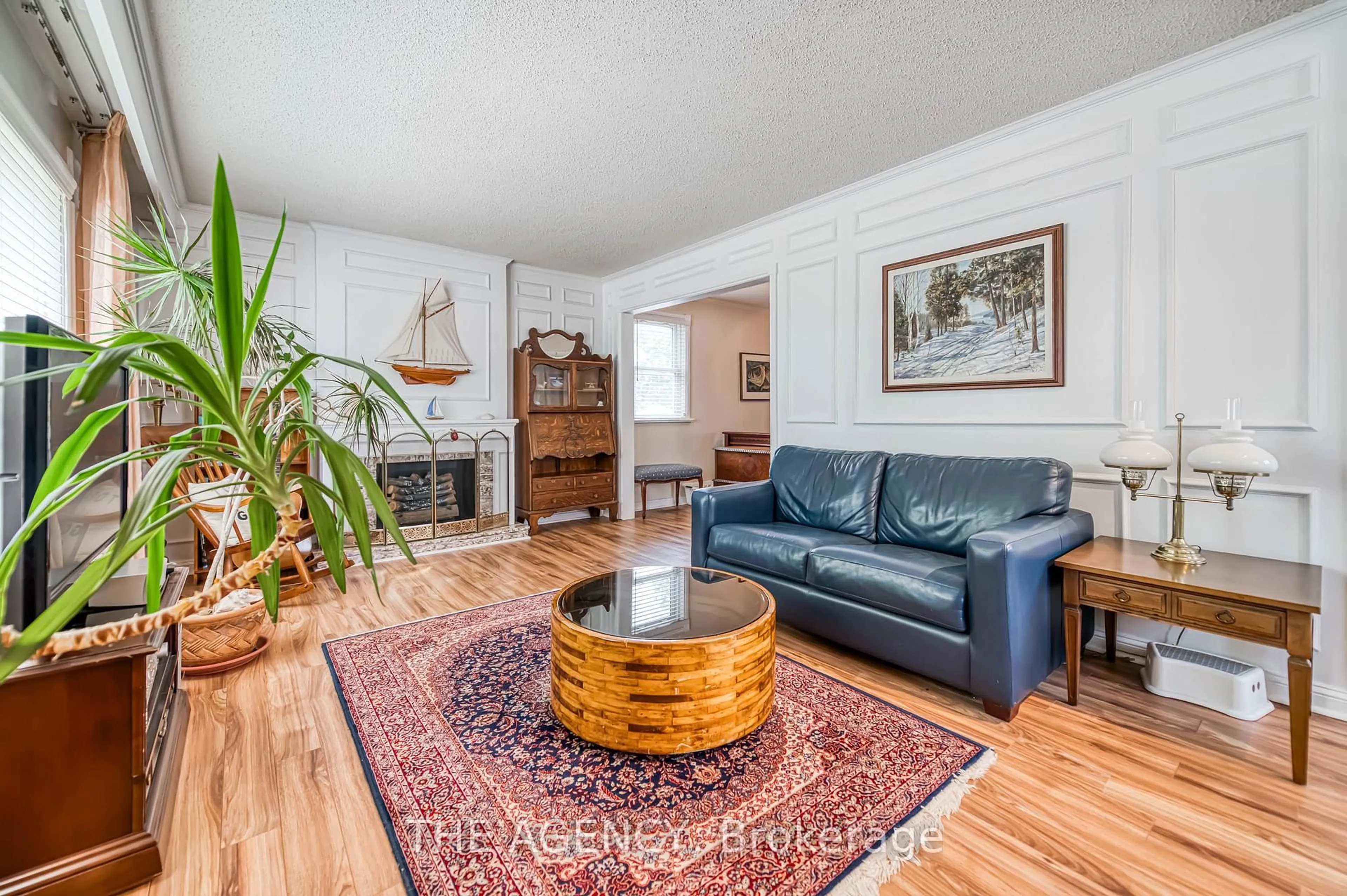 Living room with furniture, wood/laminate floor for 80 Kawartha Ave, Oshawa Ontario L1H 3Y9