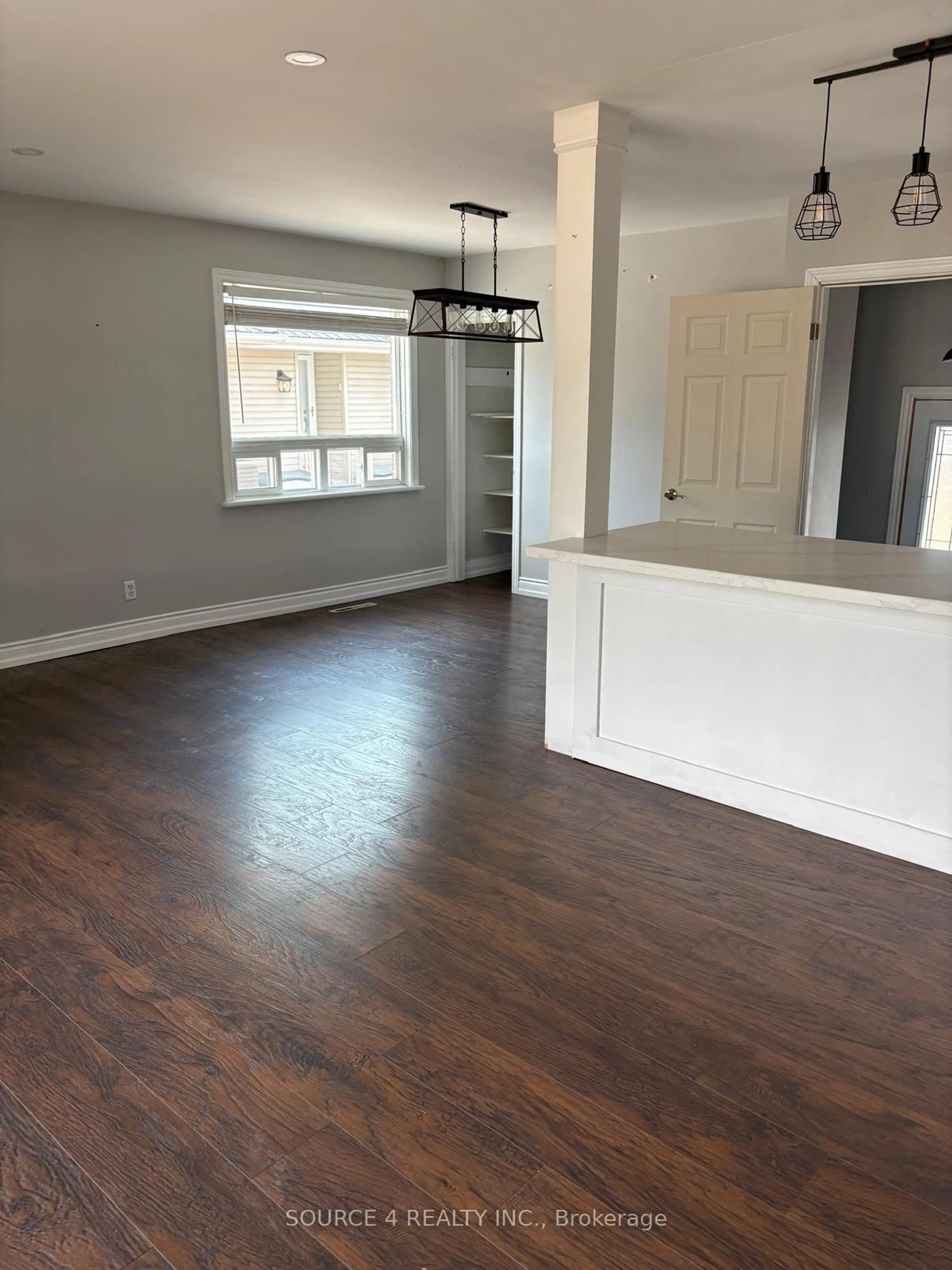Open concept kitchen, wood/laminate floor for 489 Rossland Rd, Oshawa Ontario L1J 3H1