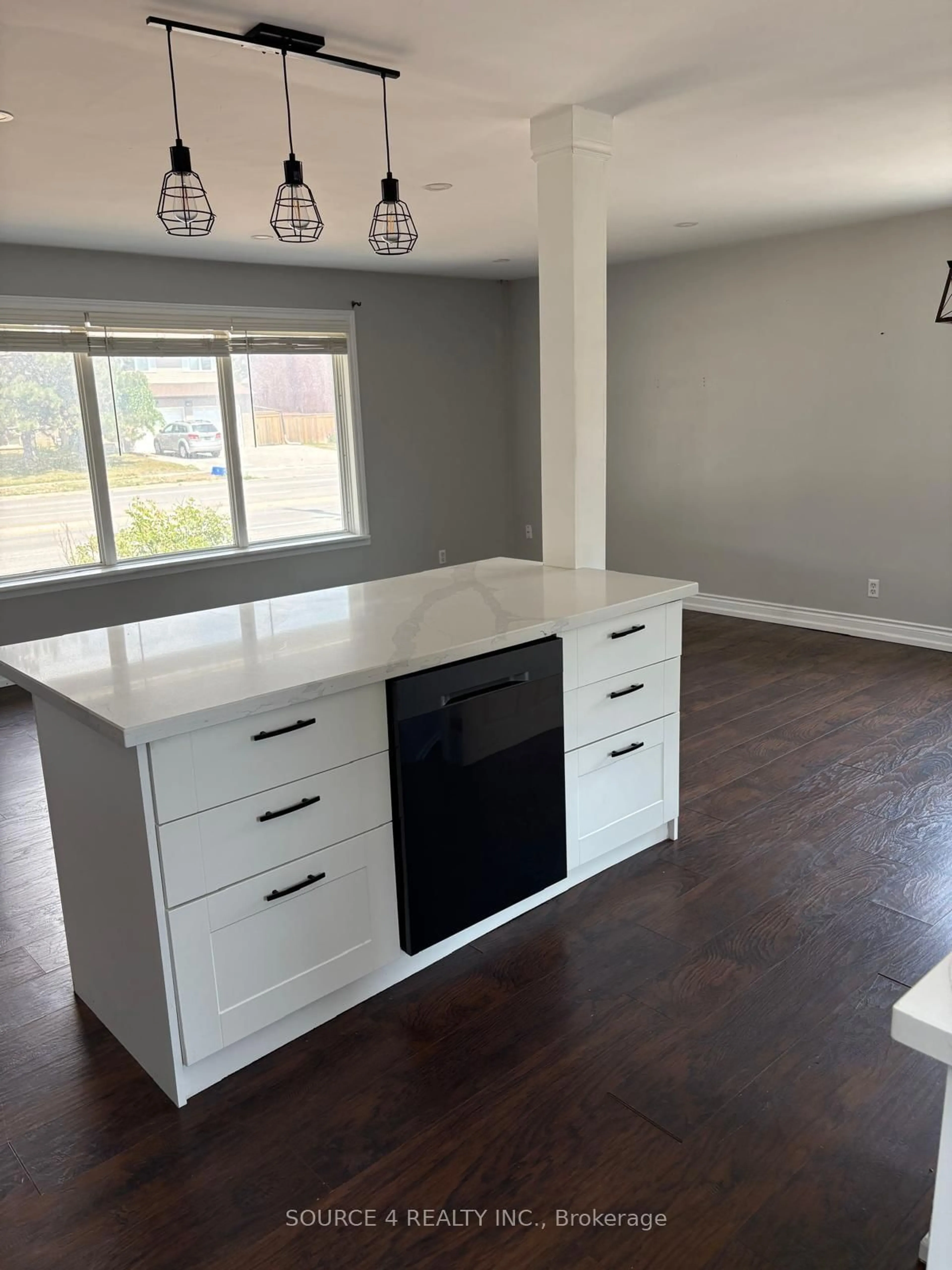 Open concept kitchen, wood/laminate floor for 489 Rossland Rd, Oshawa Ontario L1J 3H1