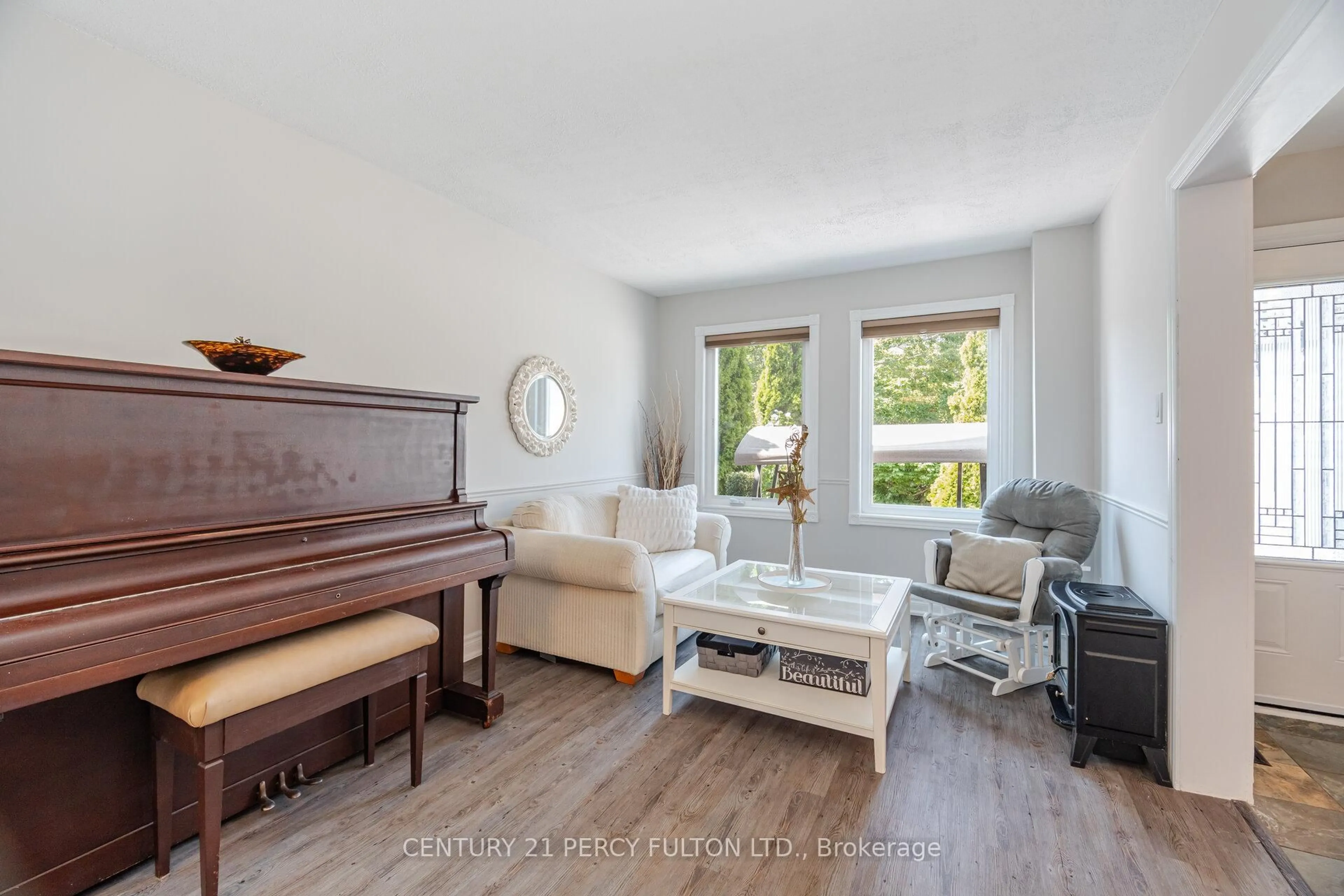 Living room with furniture, wood/laminate floor for 41 Gardiner Dr, Ajax Ontario L1S 5Y4