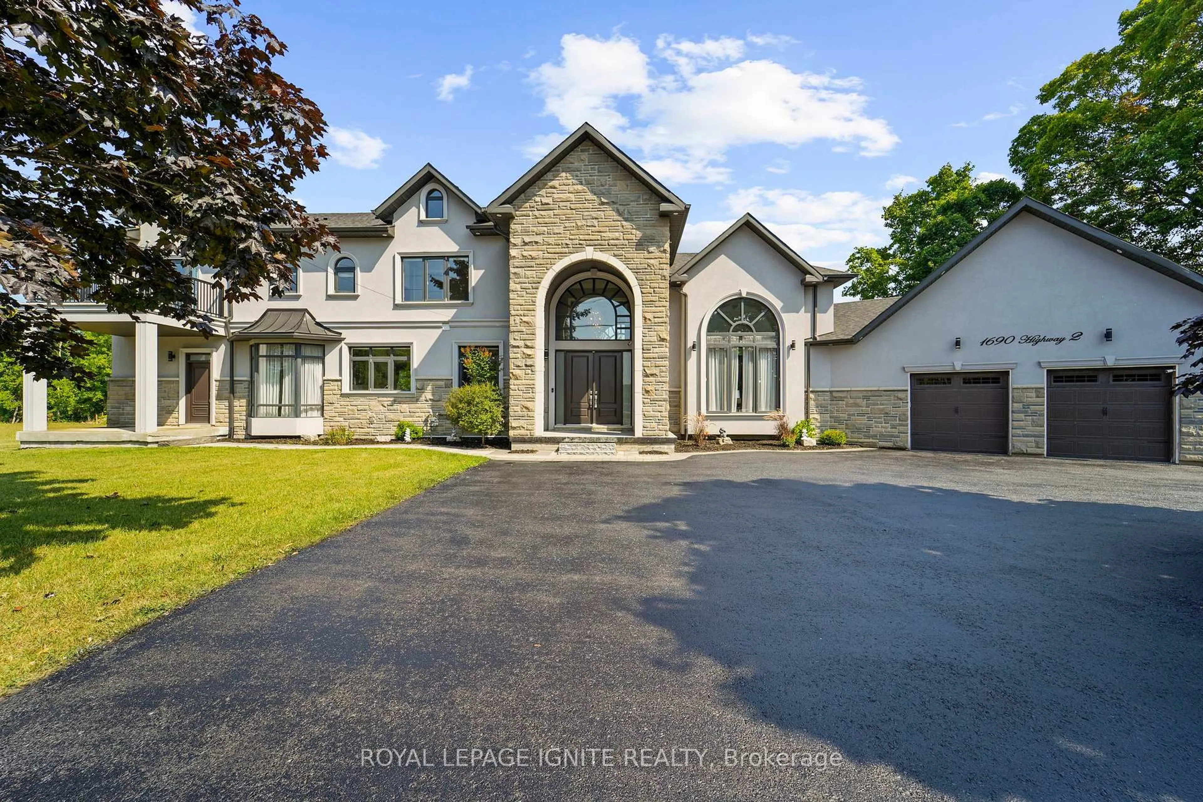 A pic from outside/outdoor area/front of a property/back of a property/a pic from drone, street for 1690 Highway 2 Rd, Clarington Ontario L1E 2R6