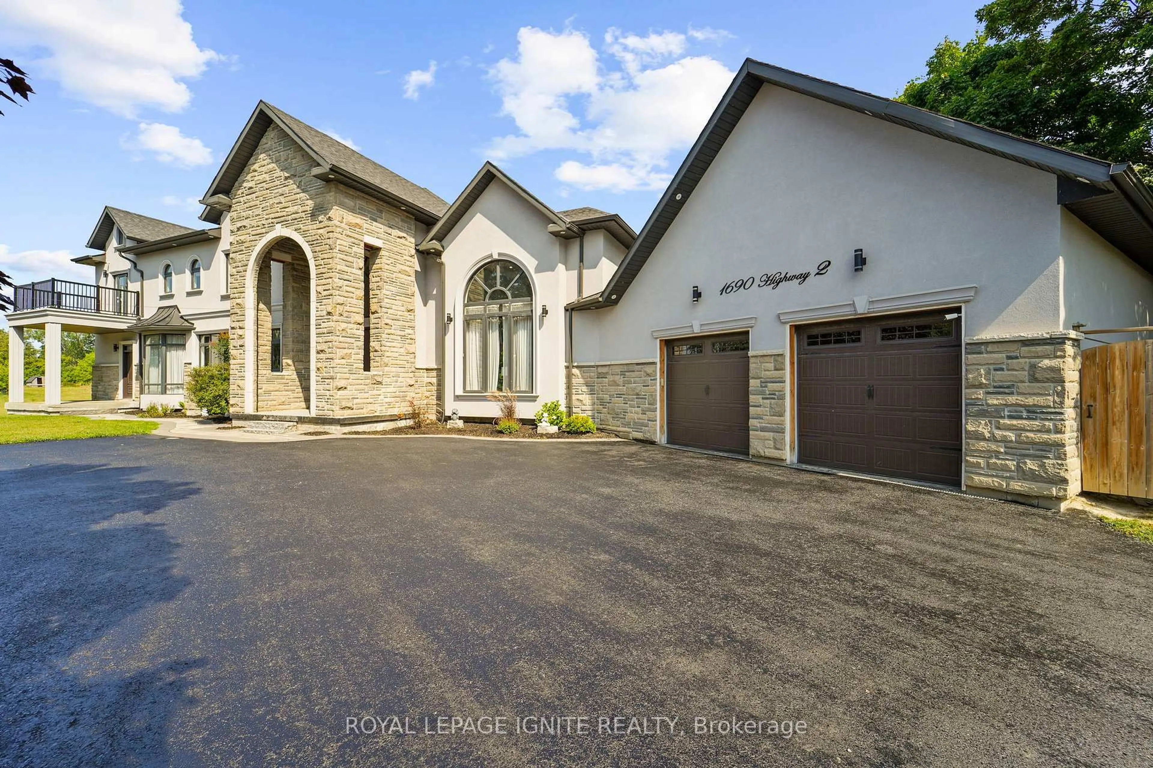 Home with brick exterior material, street for 1690 Highway 2 Rd, Clarington Ontario L1E 2R6