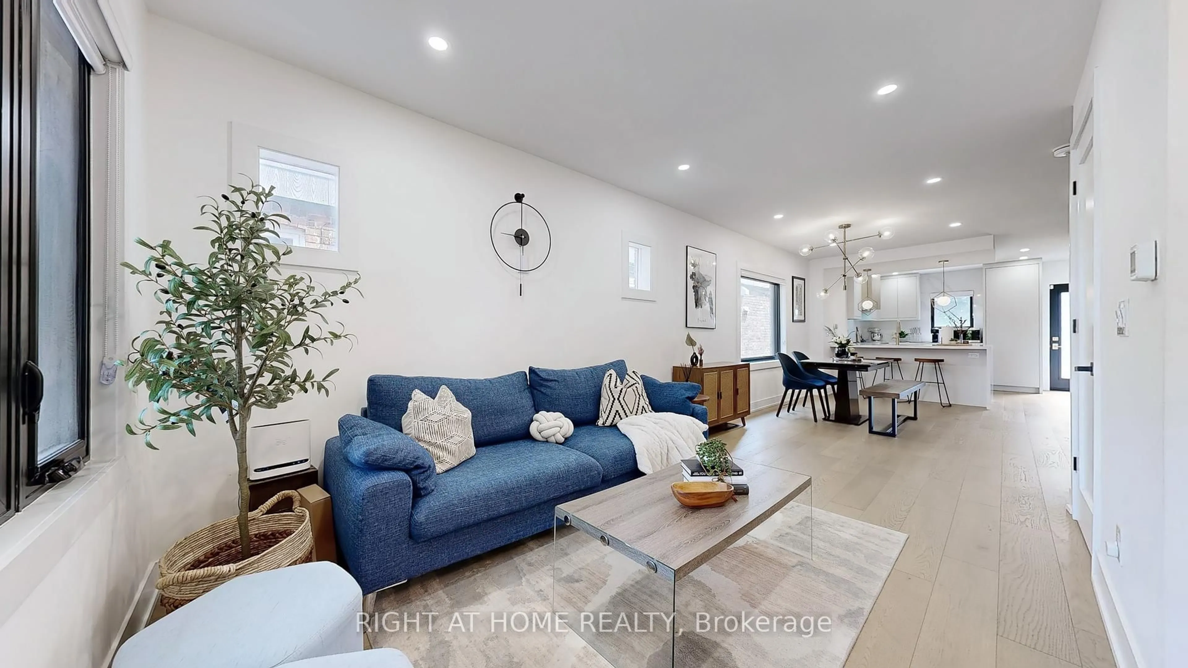 Living room with furniture, unknown for 201 Springdale Blvd, Toronto Ontario M4C 1Z6