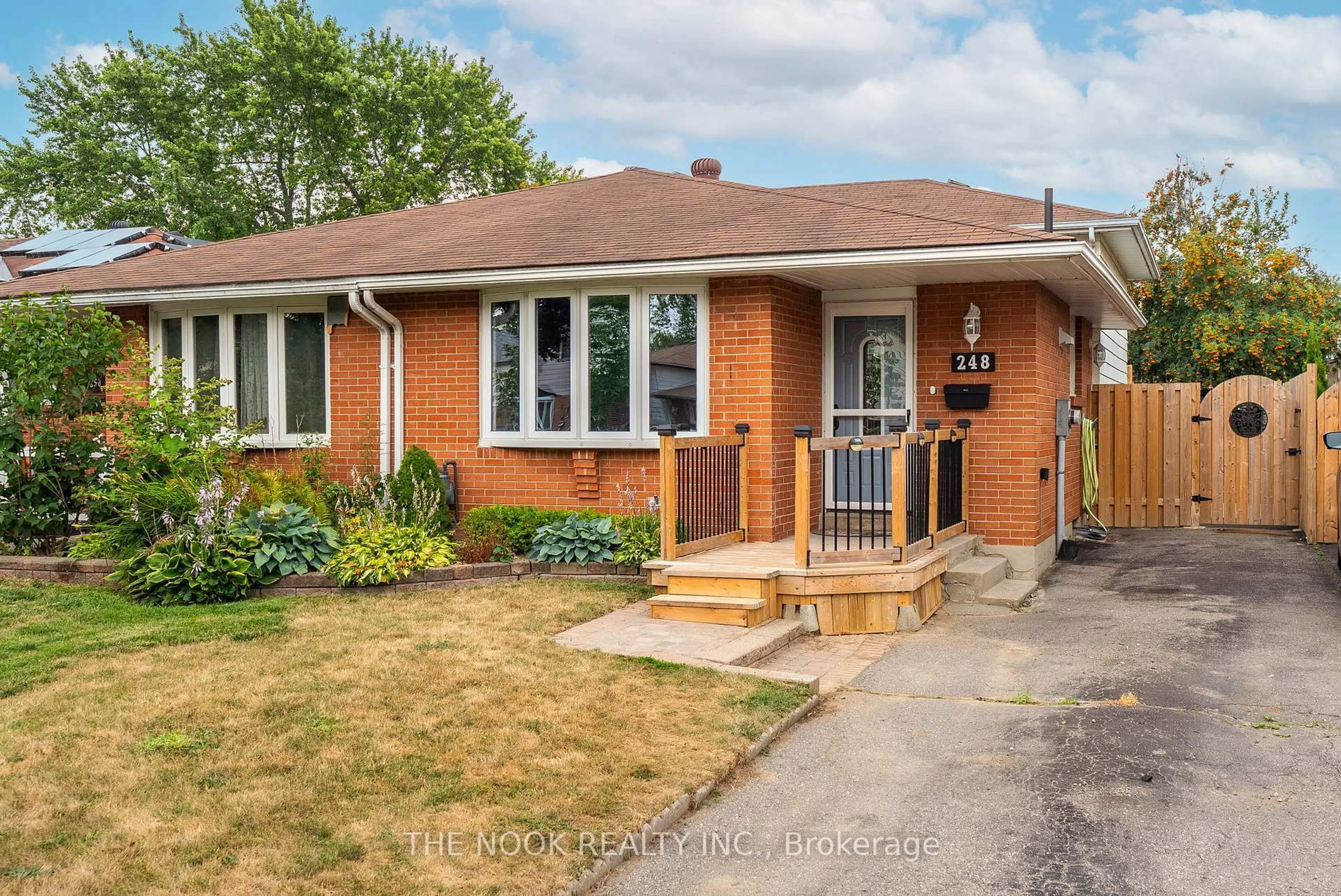 Home with brick exterior material, street for 248 Kinmount Cres, Oshawa Ontario L1J 3T7